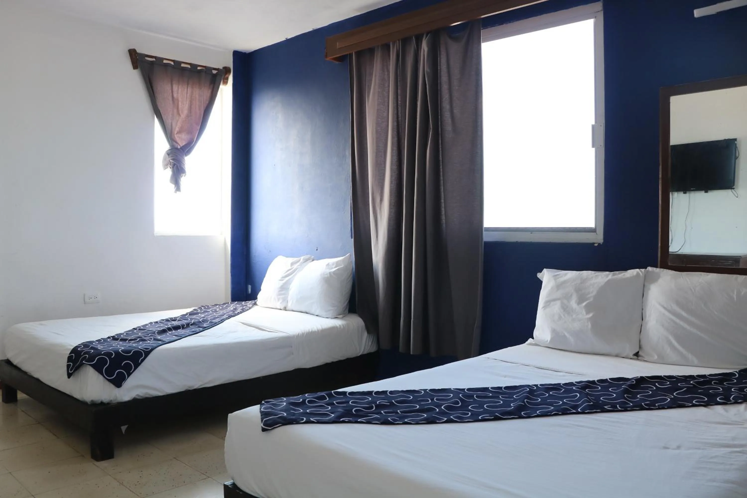 Bed in Hotel Tropical