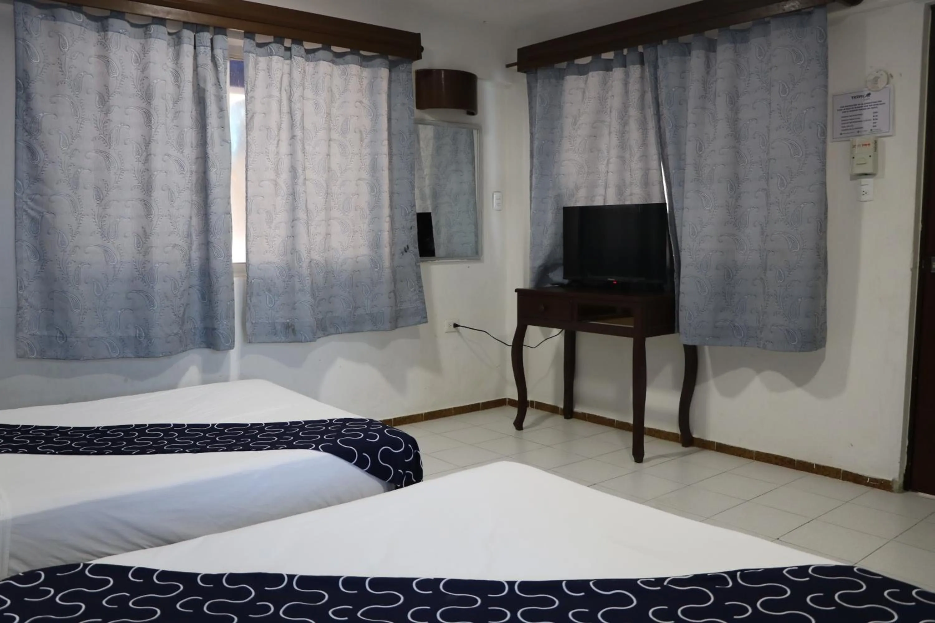 Bed in Hotel Tropical