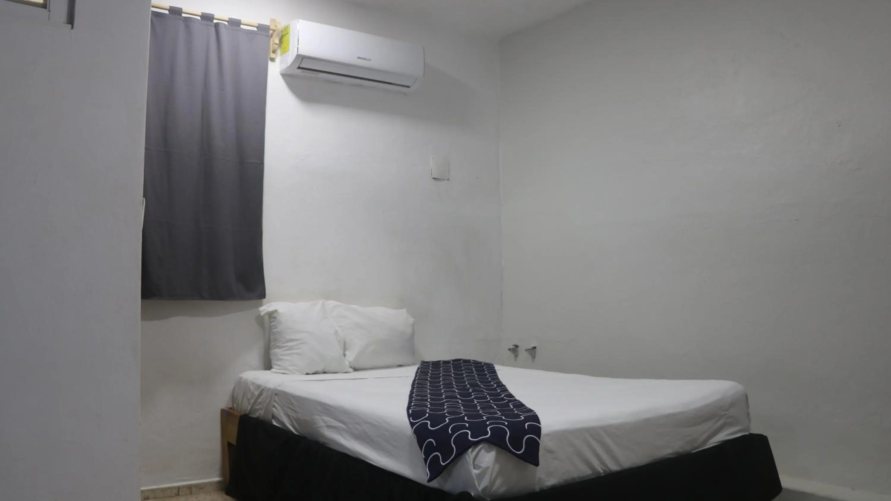 Bed in Hotel Tropical