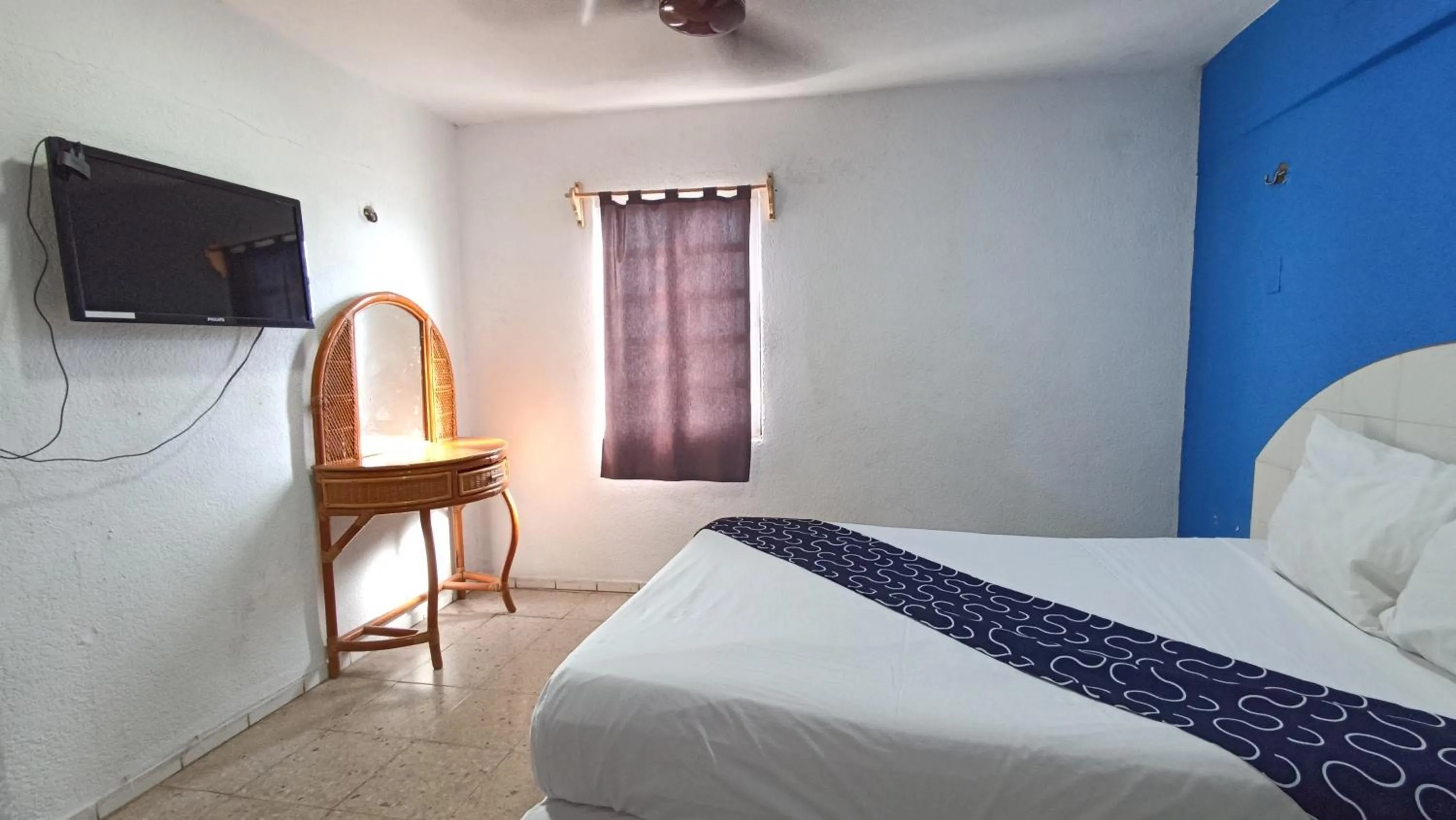 Bed in Hotel Tropical
