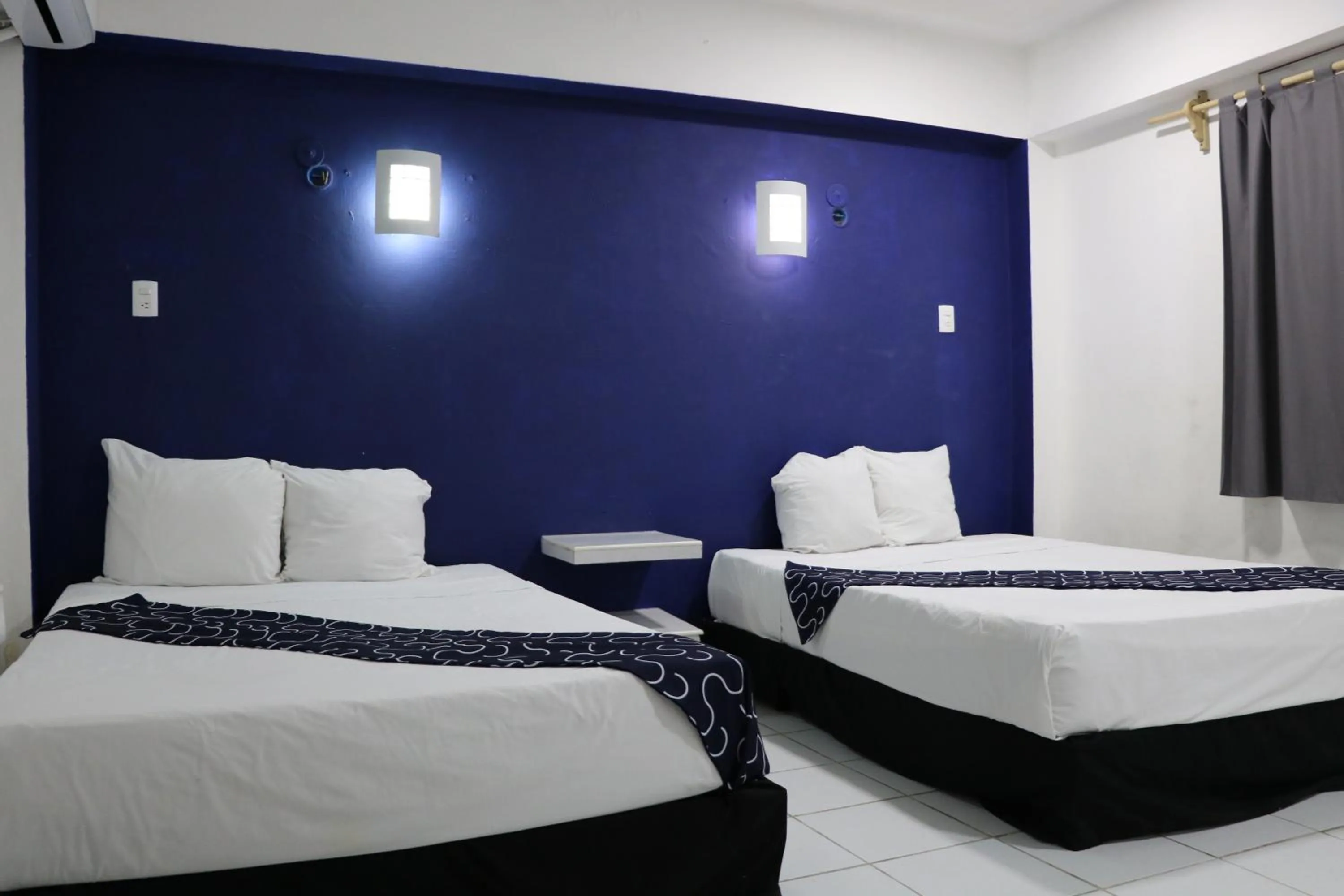 Bed in Hotel Tropical