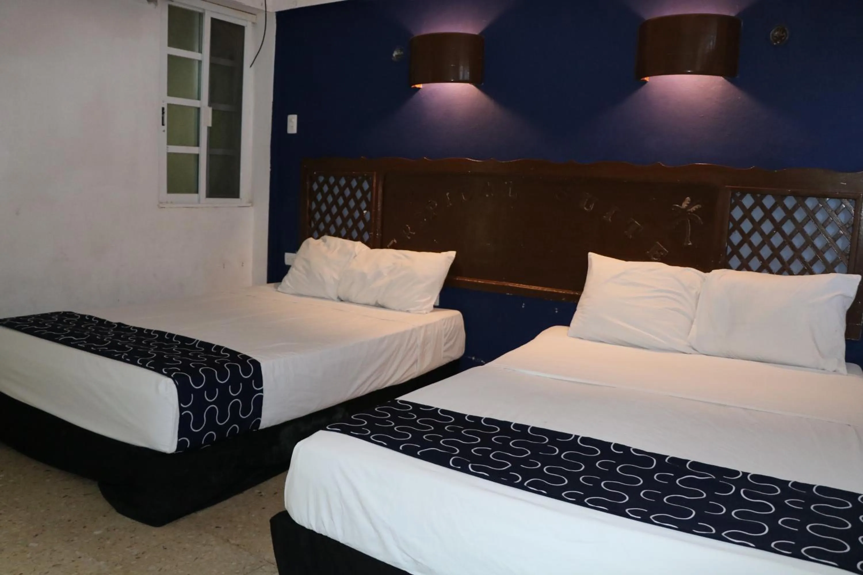 Bed in Hotel Tropical