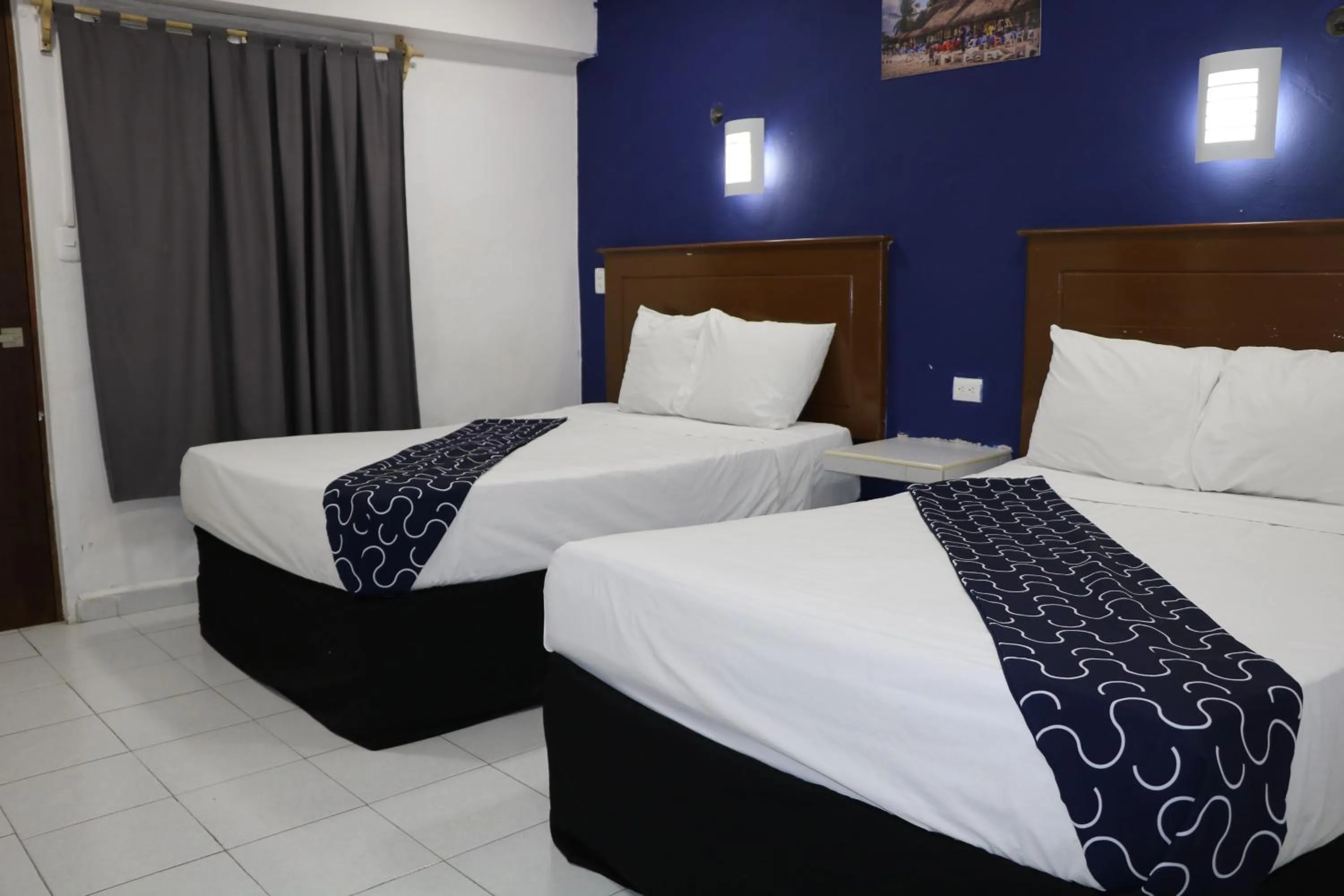 Bed in Hotel Tropical