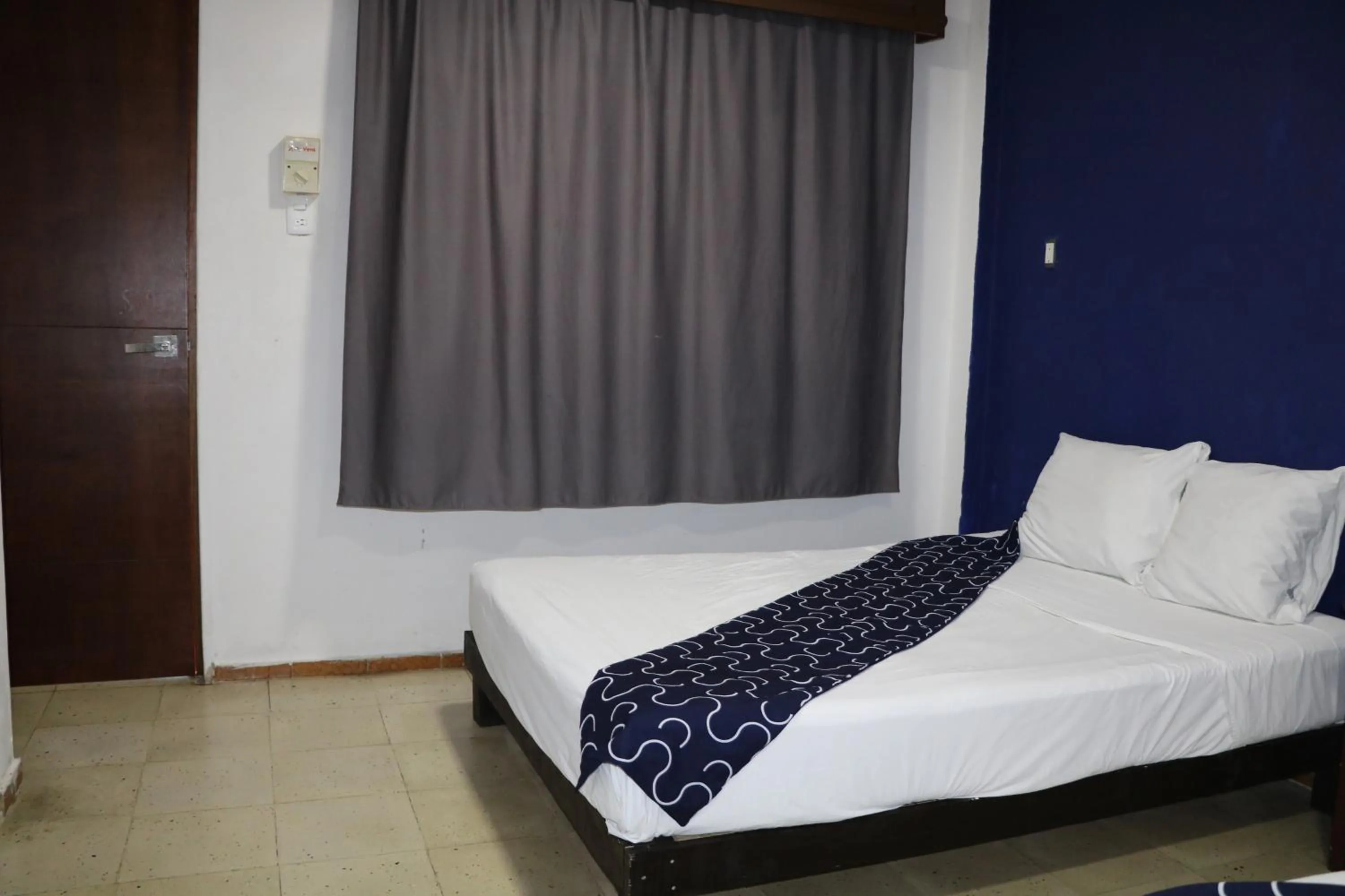 Bed in Hotel Tropical