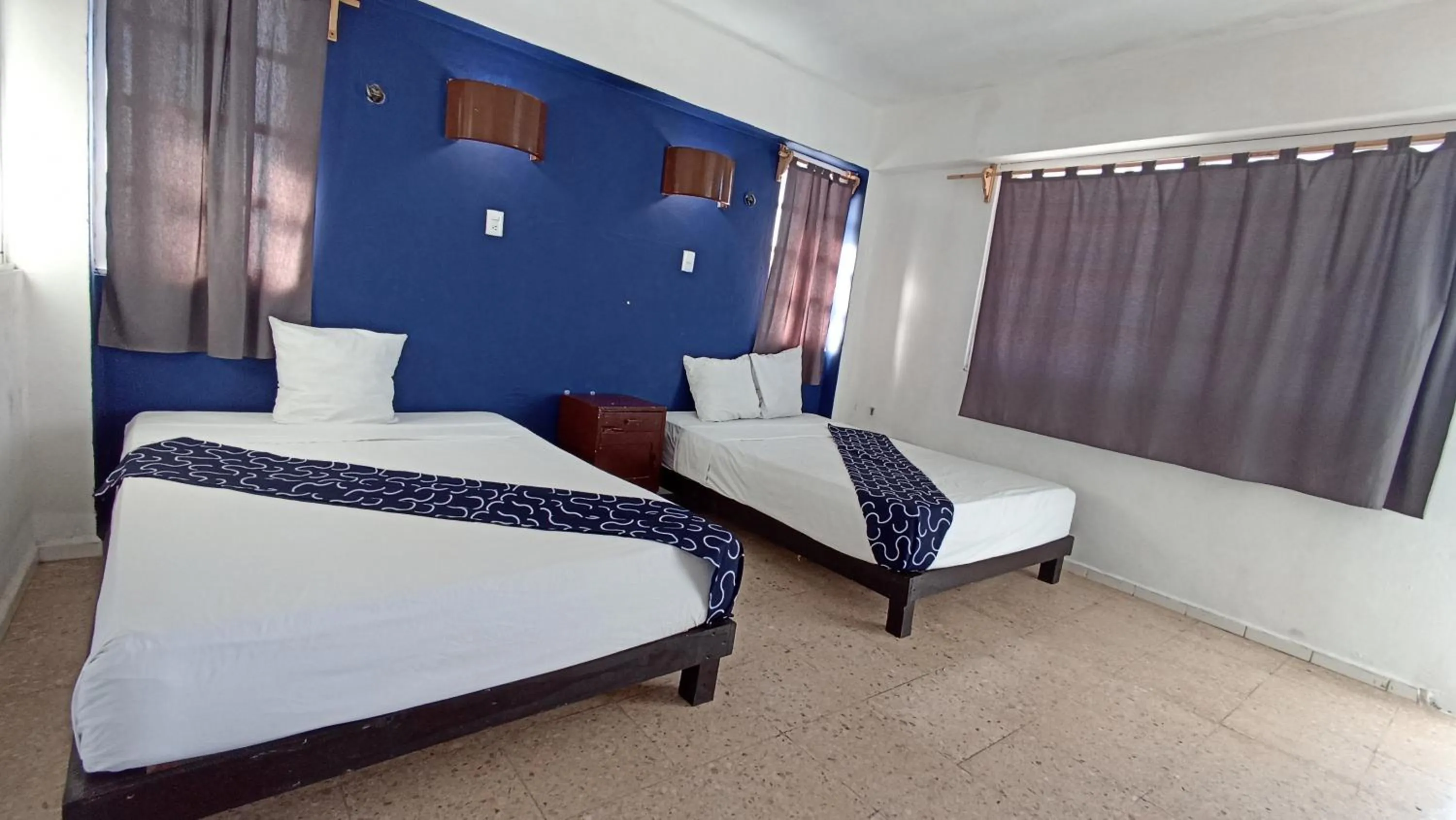 Bed in Hotel Tropical