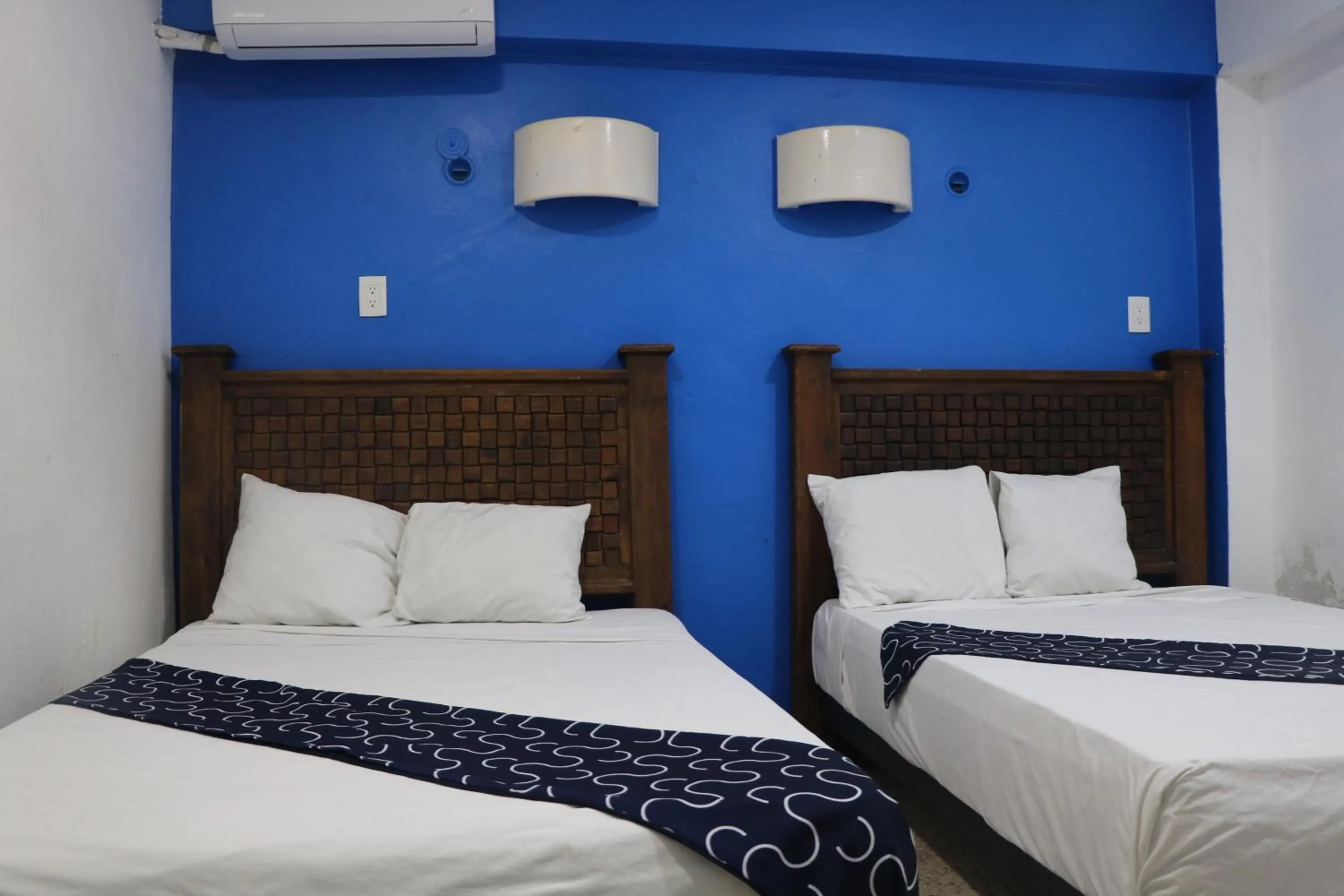 Bed in Hotel Tropical