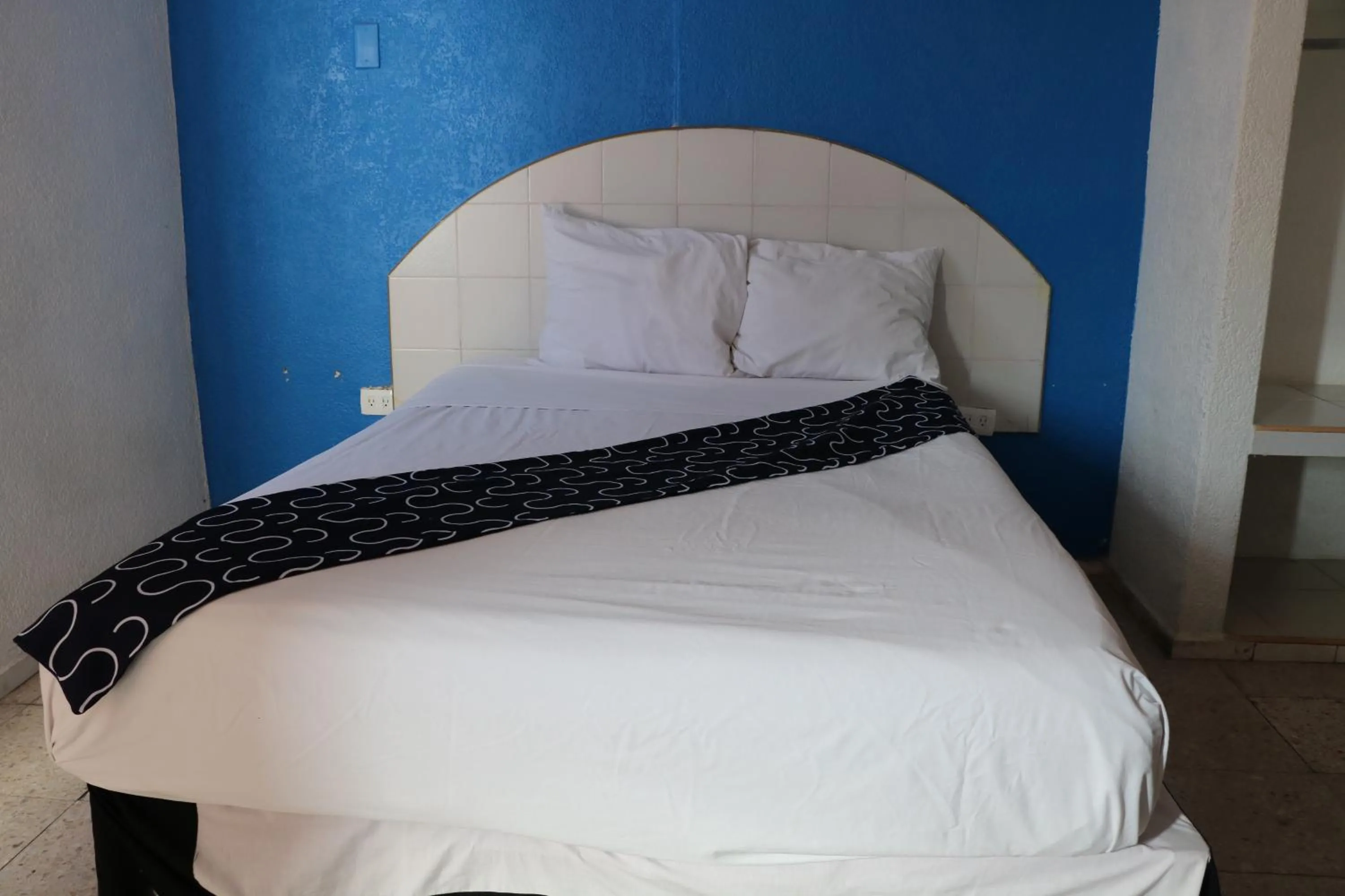 Bed in Hotel Tropical