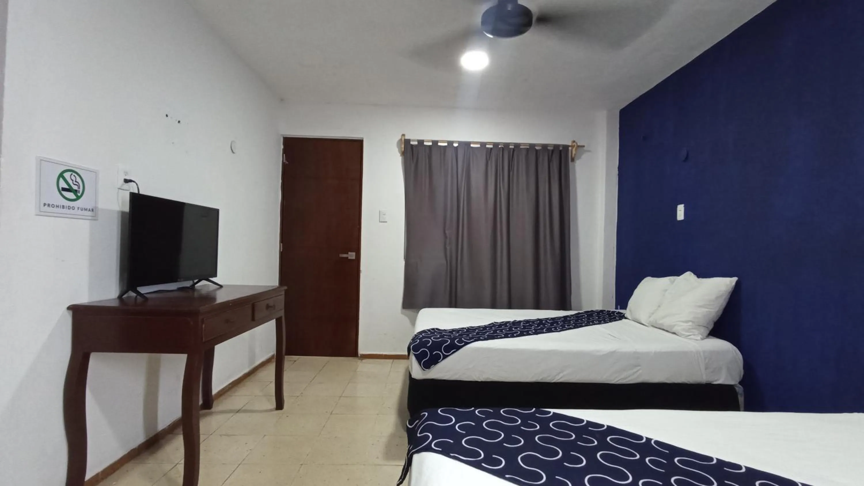 Bed in Hotel Tropical