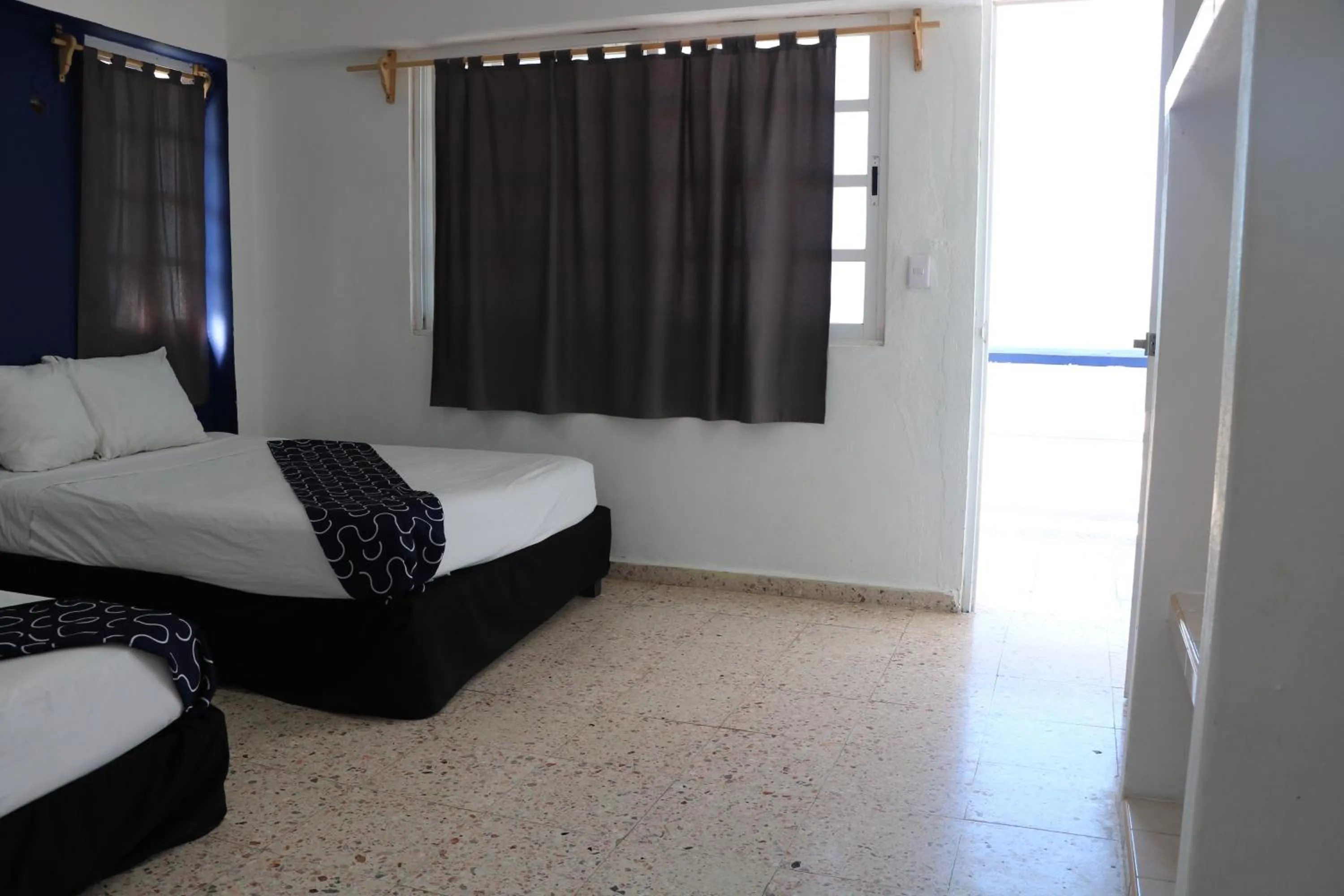 Bed in Hotel Tropical
