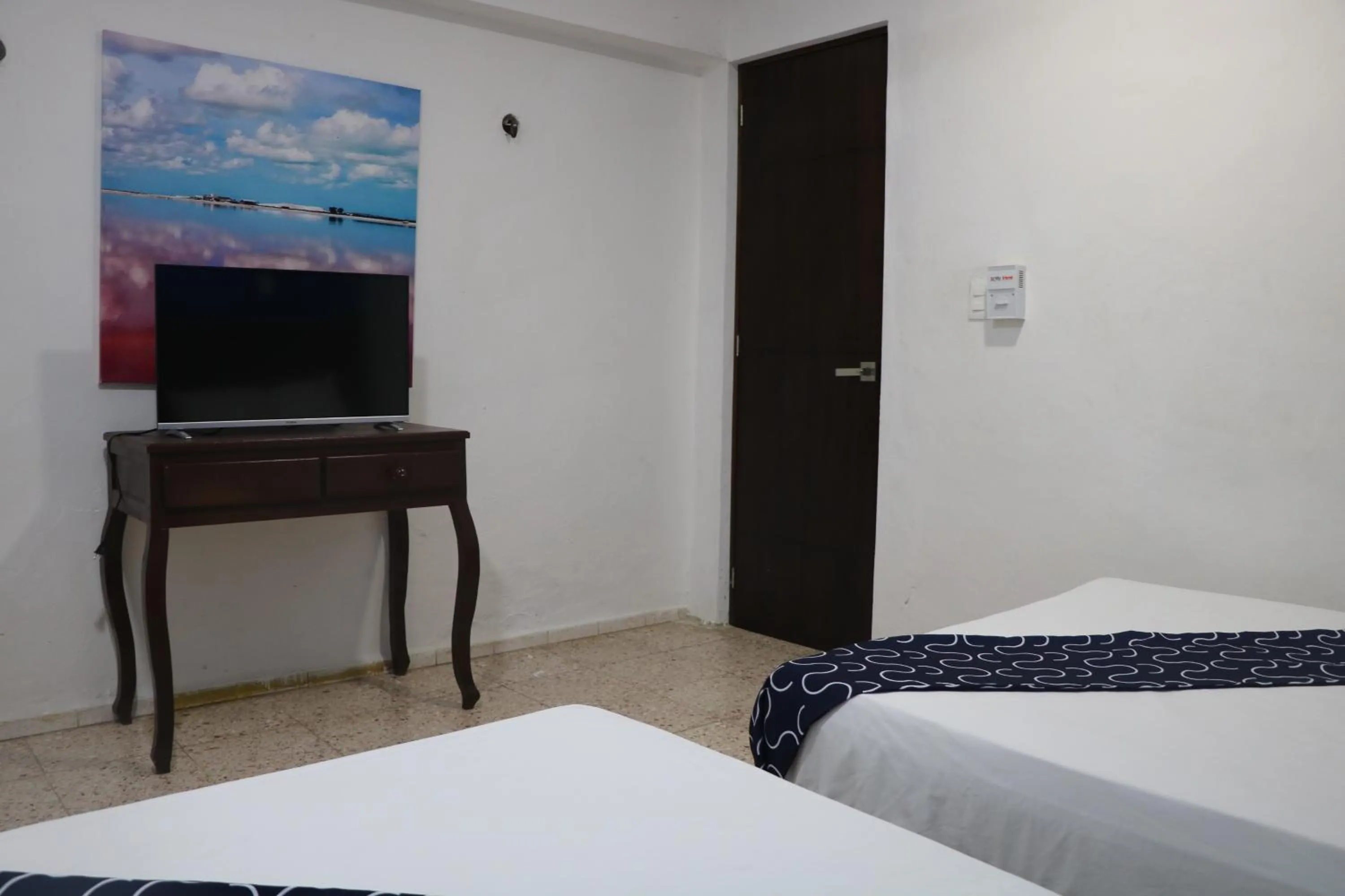 Bed in Hotel Tropical