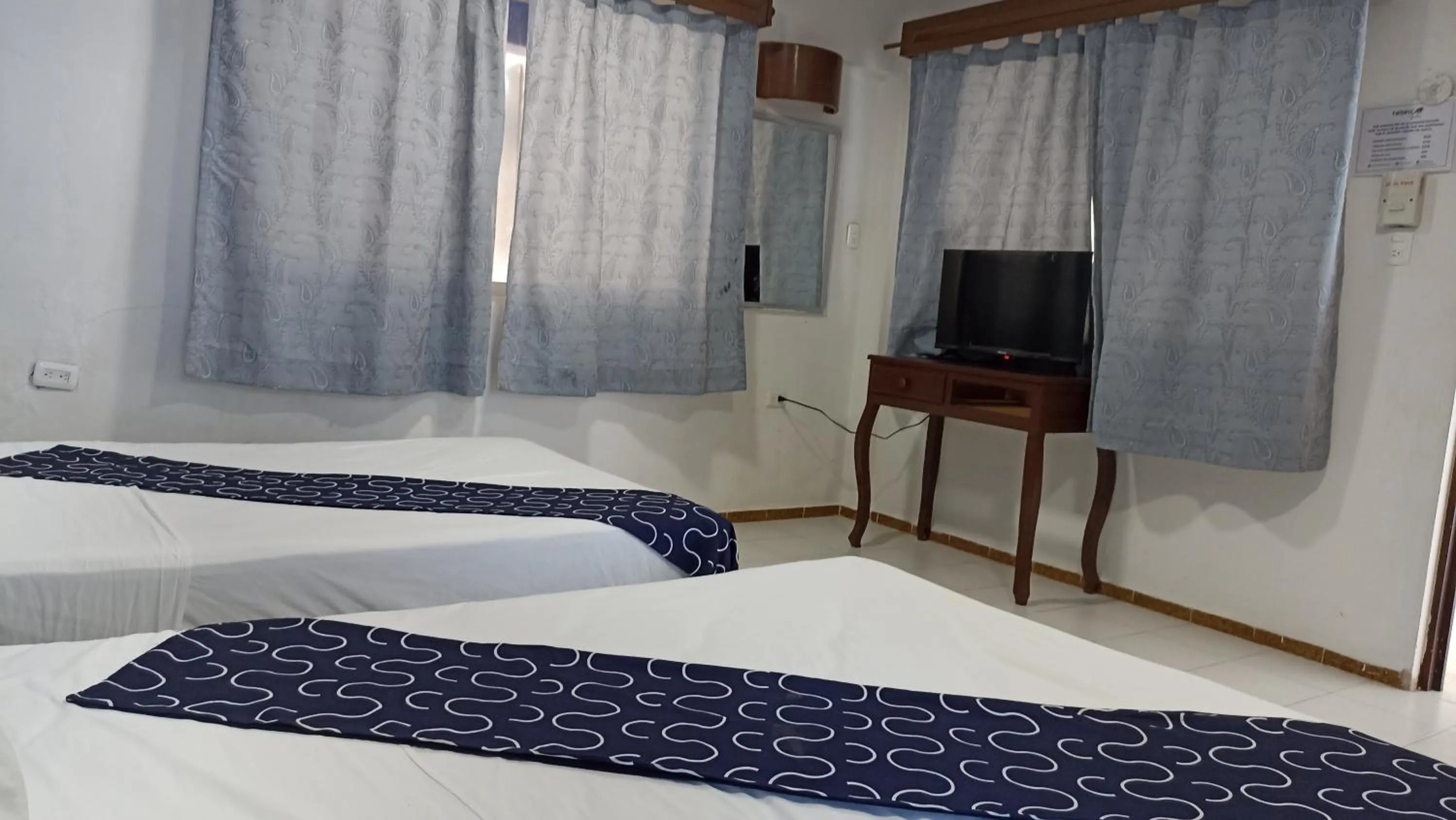 Bed in Hotel Tropical