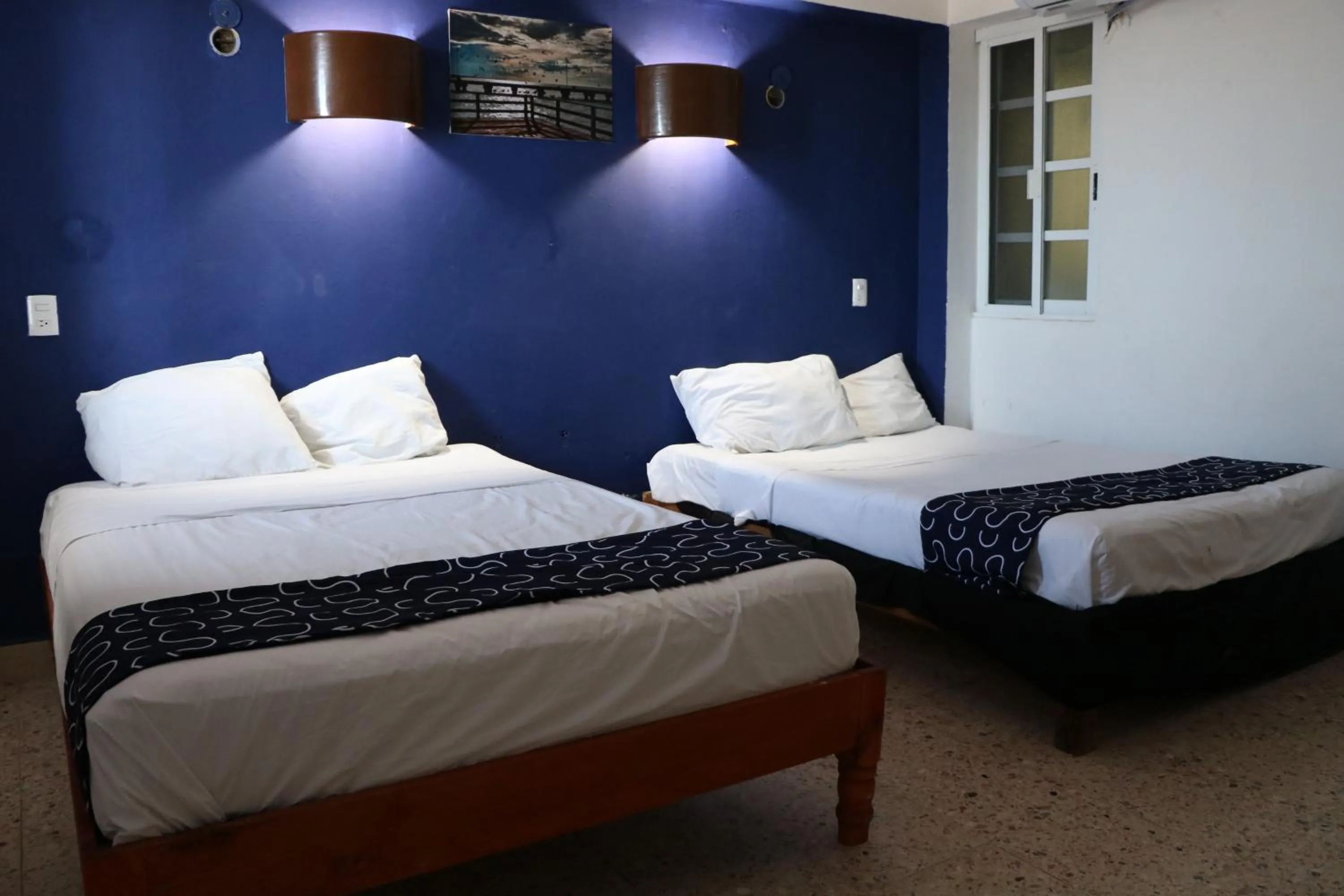 Bed in Hotel Tropical