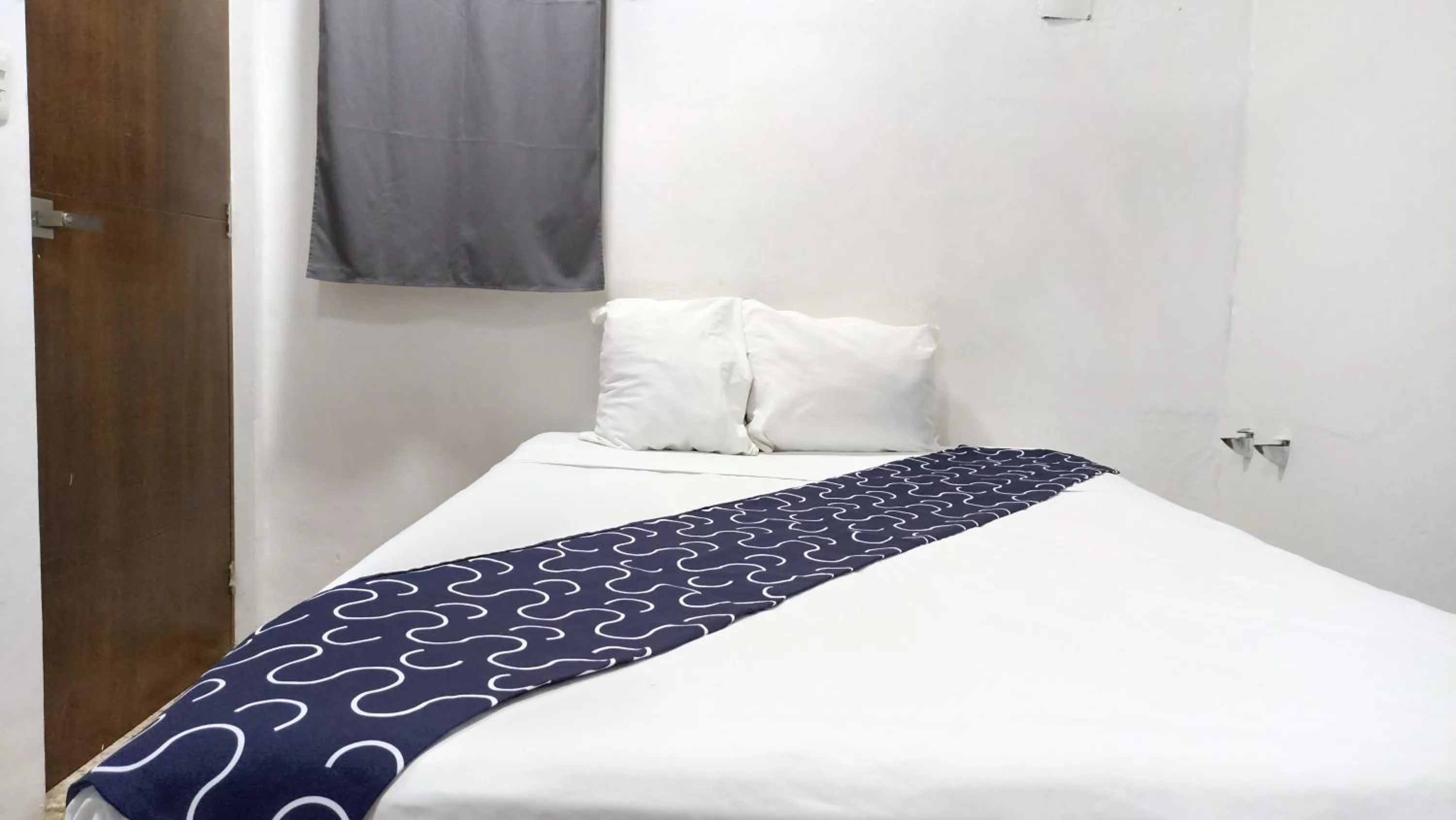 Bed in Hotel Tropical