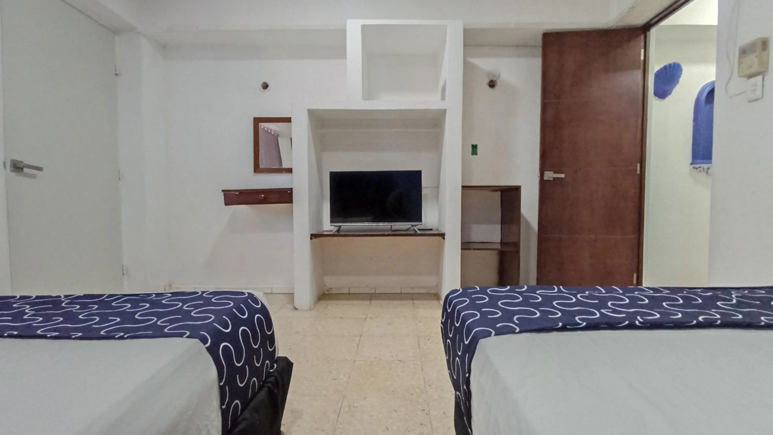 Bed in Hotel Tropical