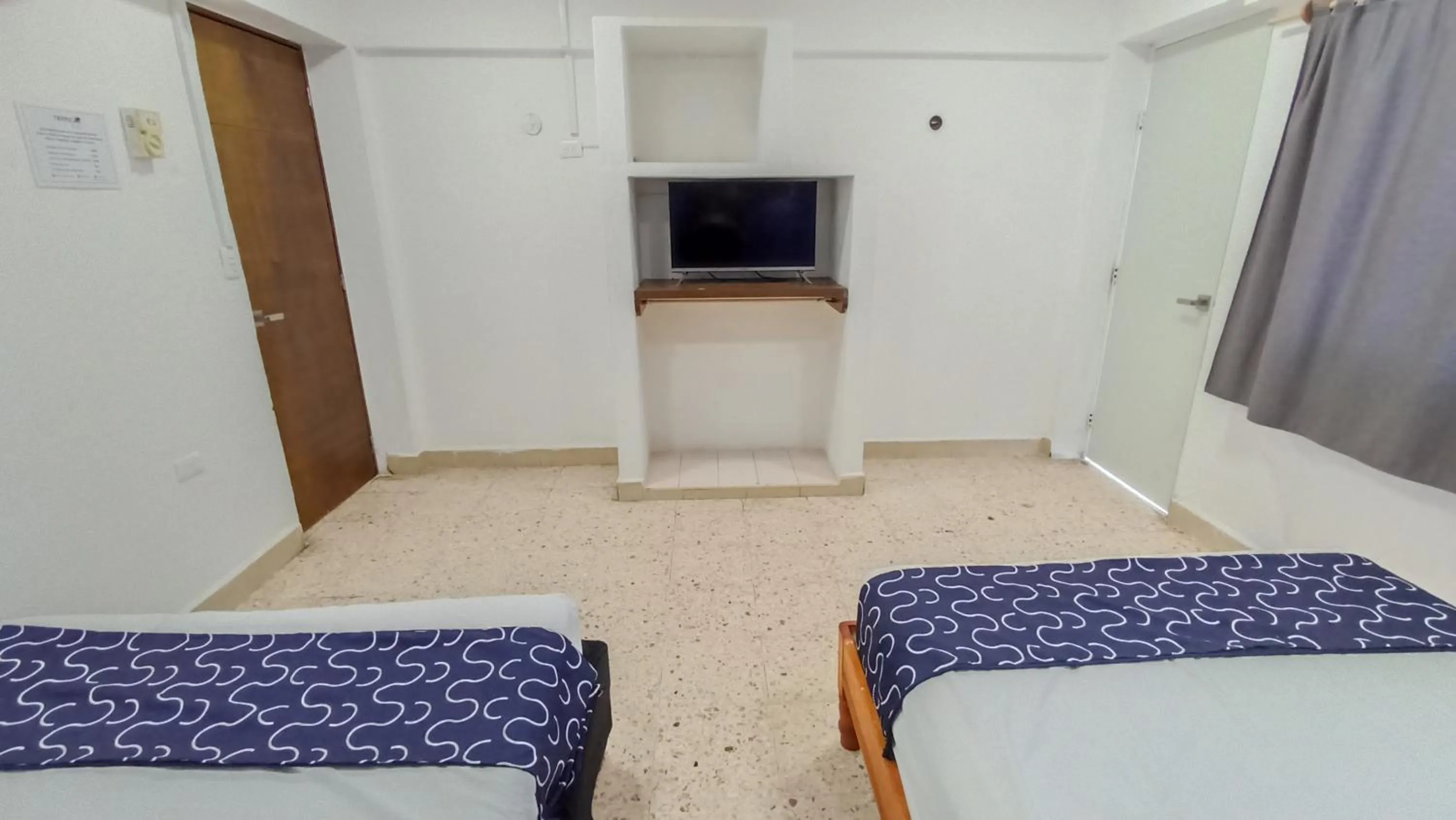 Bed in Hotel Tropical