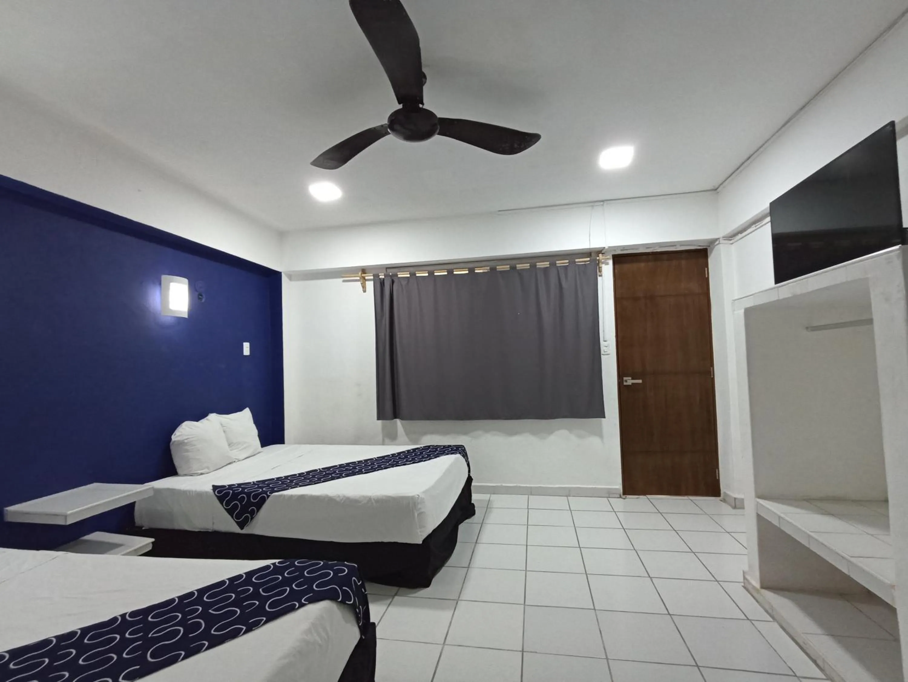 Bed in Hotel Tropical