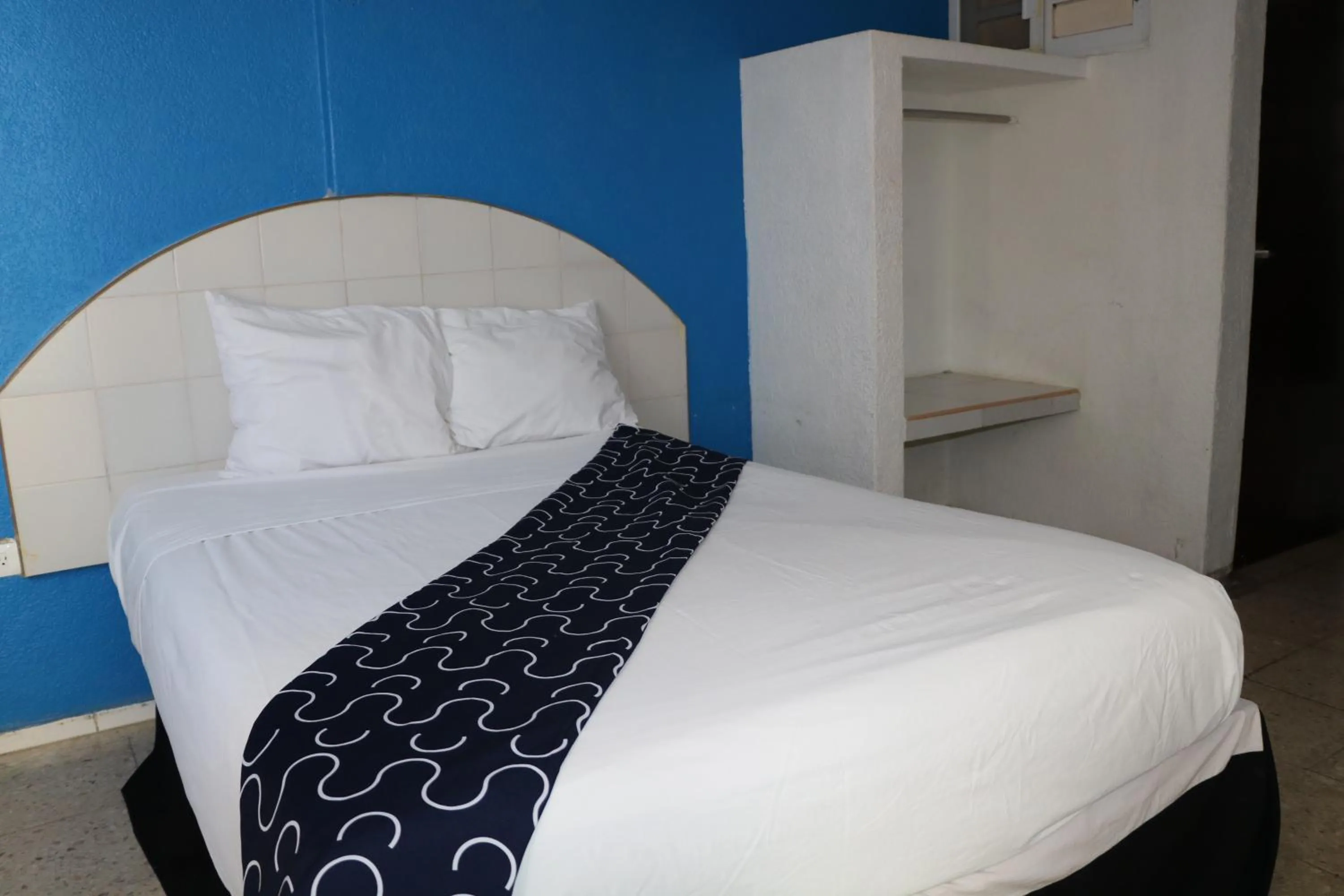 Bed in Hotel Tropical