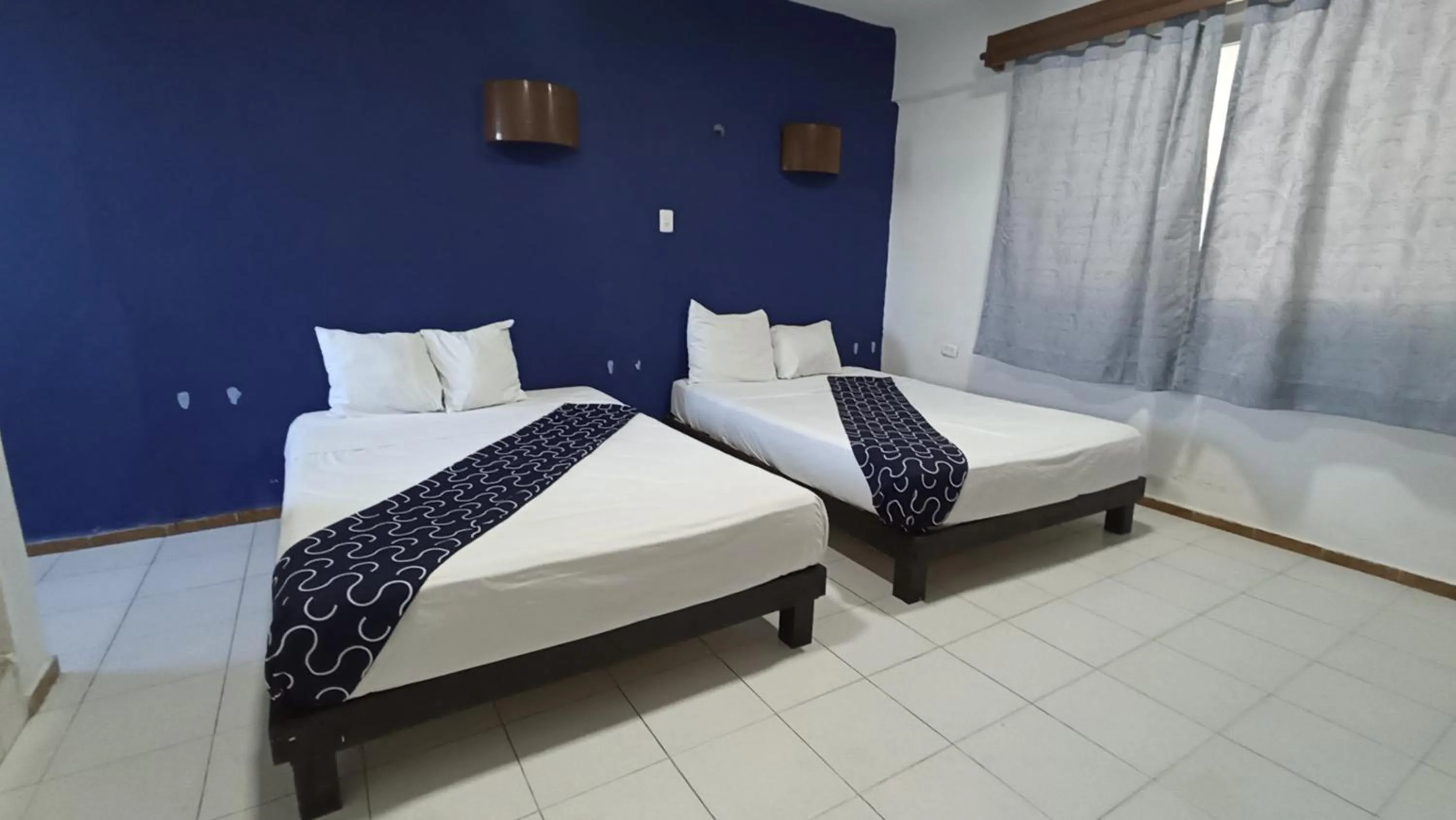 Bed in Hotel Tropical