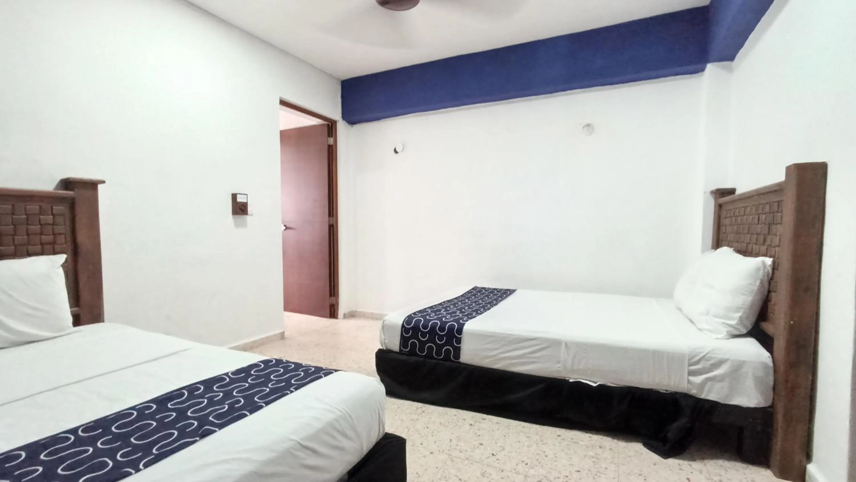 Bed in Hotel Tropical