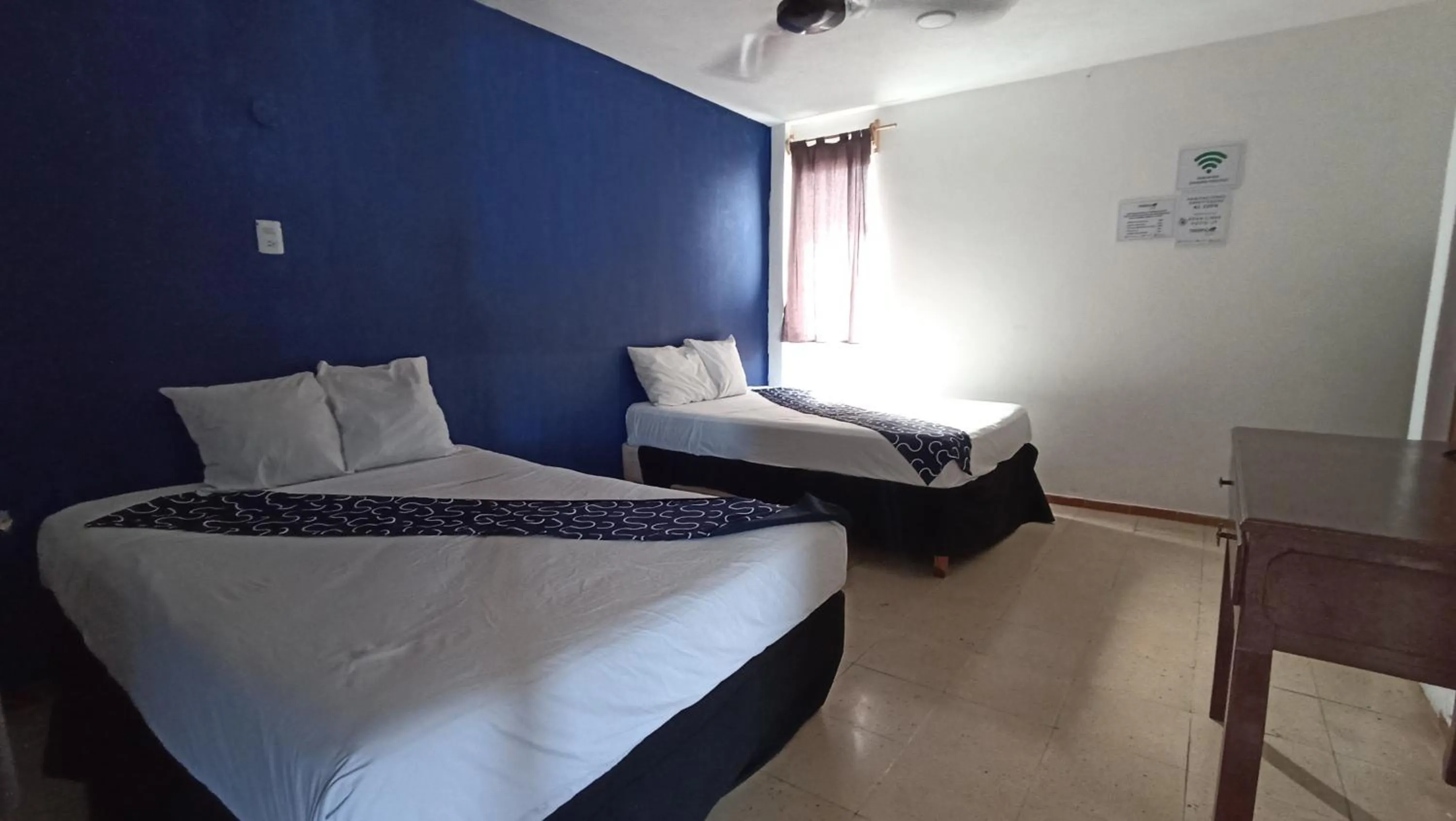 Bed in Hotel Tropical