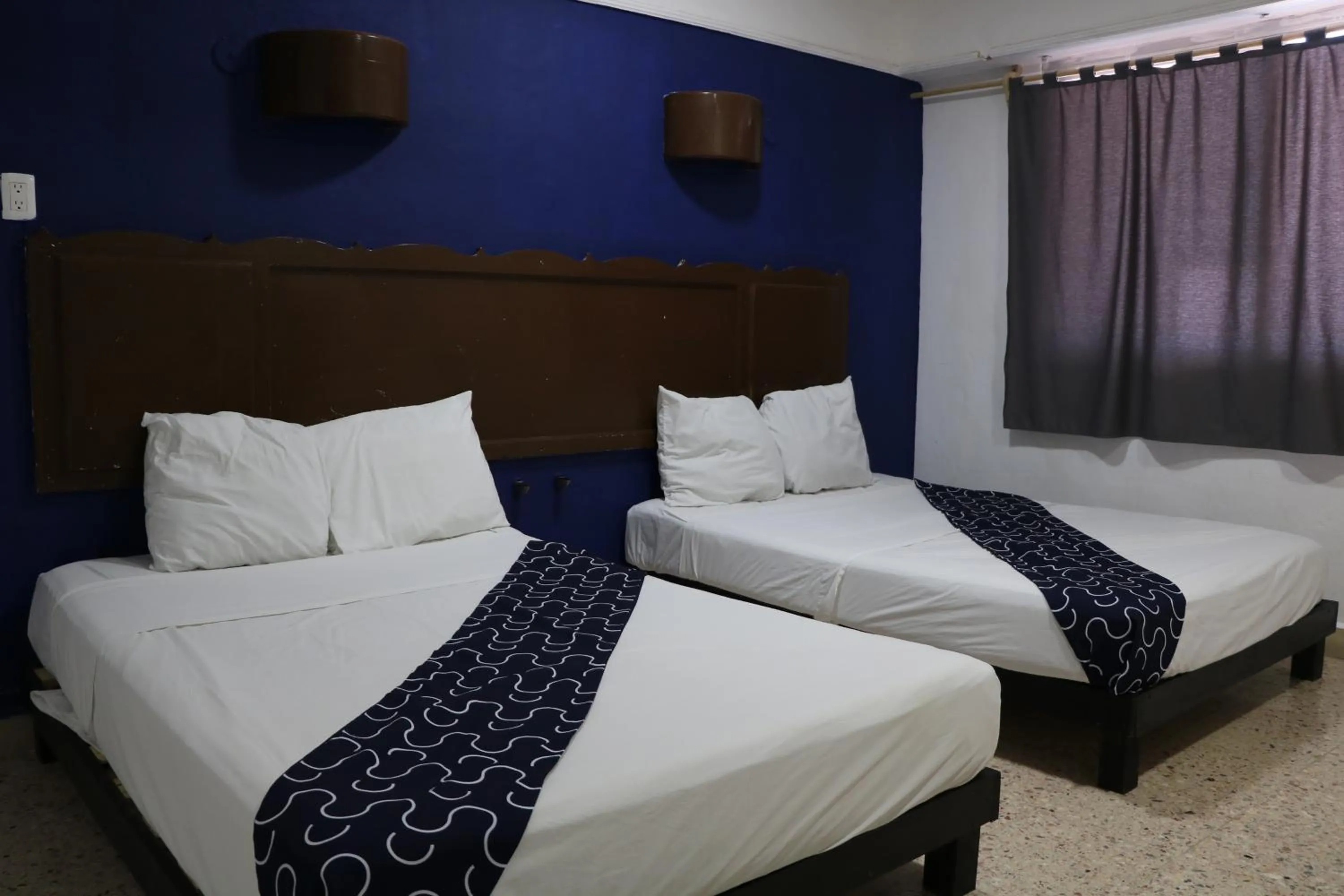 Bed in Hotel Tropical