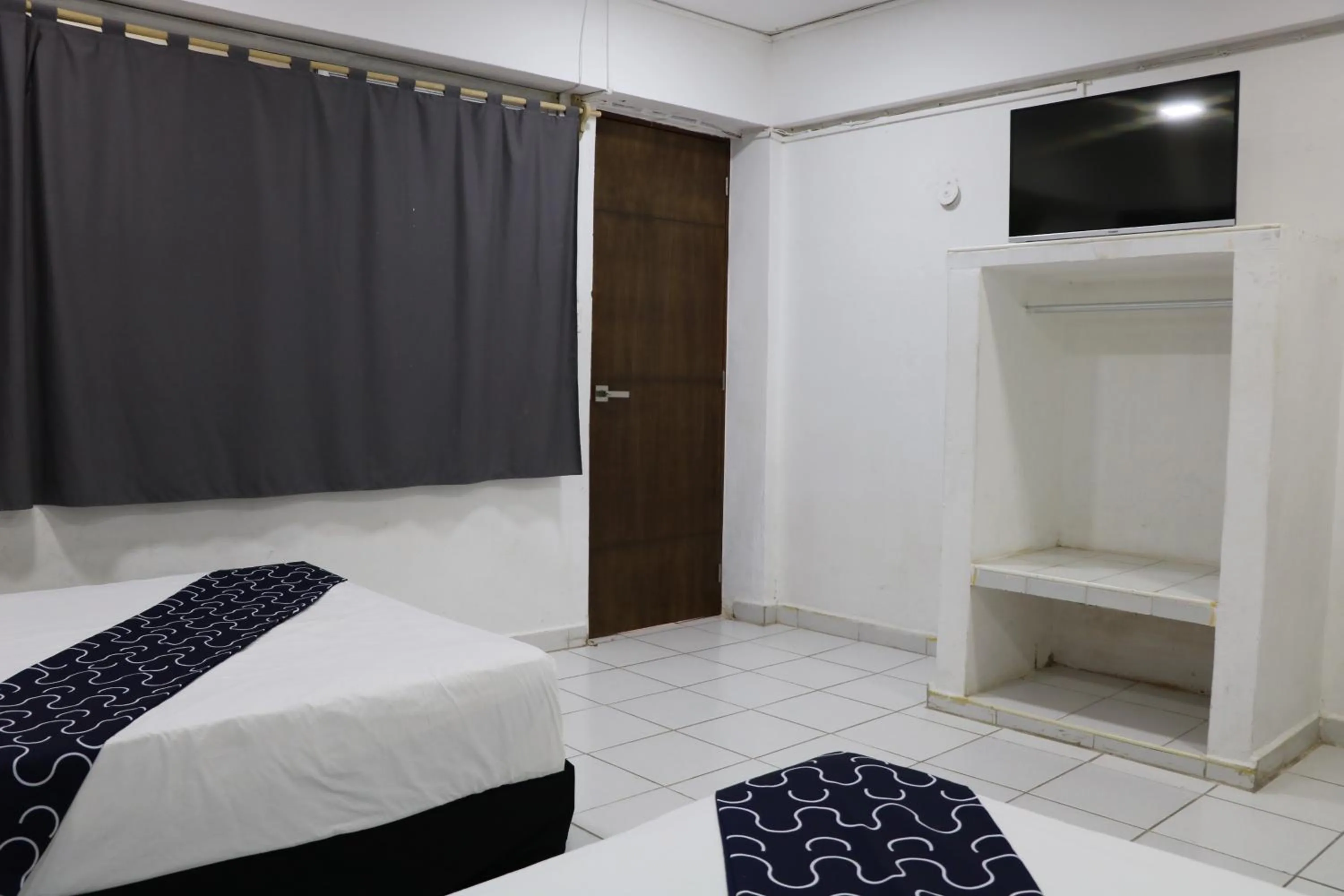 Bed in Hotel Tropical