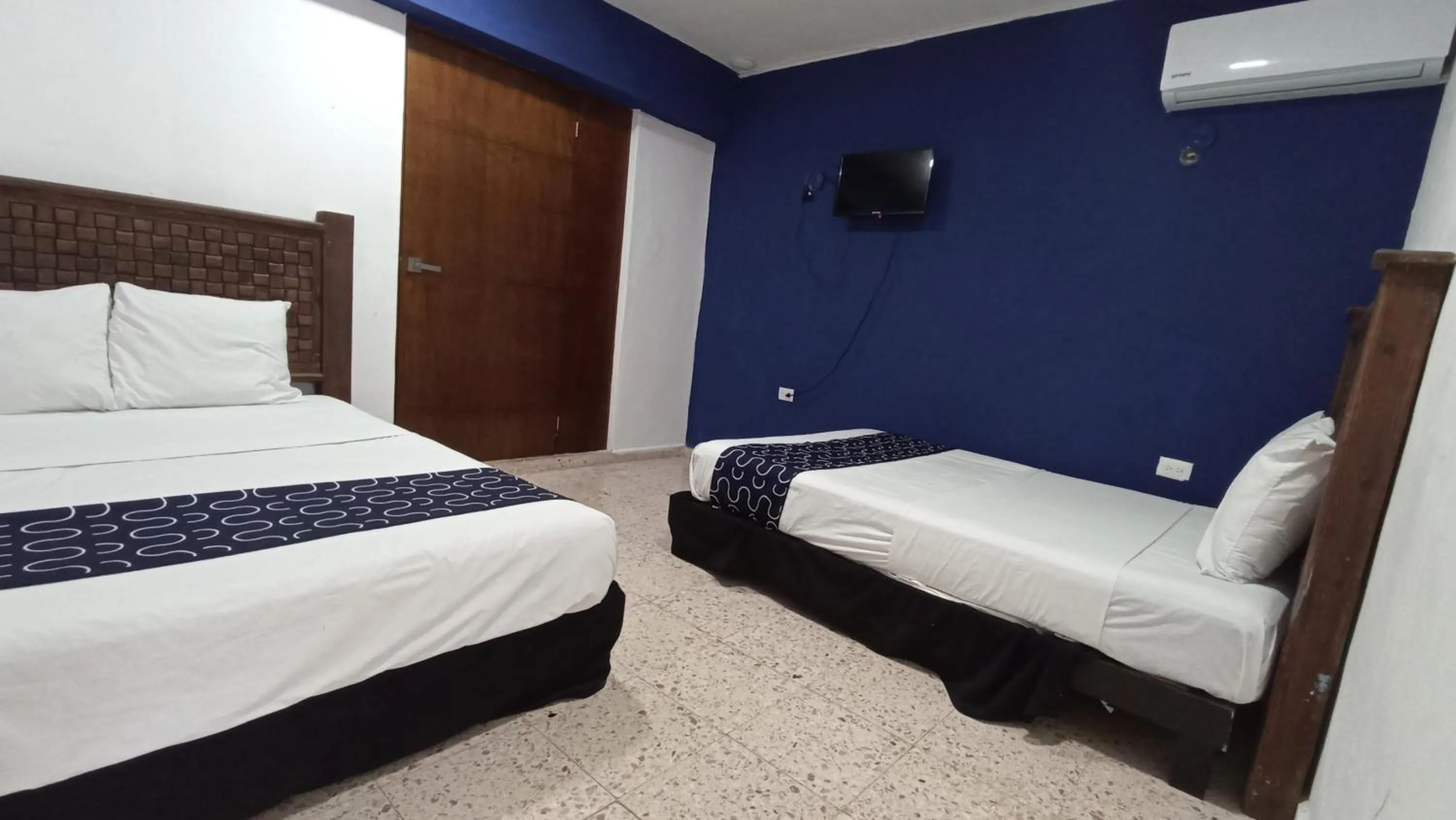 Bed in Hotel Tropical