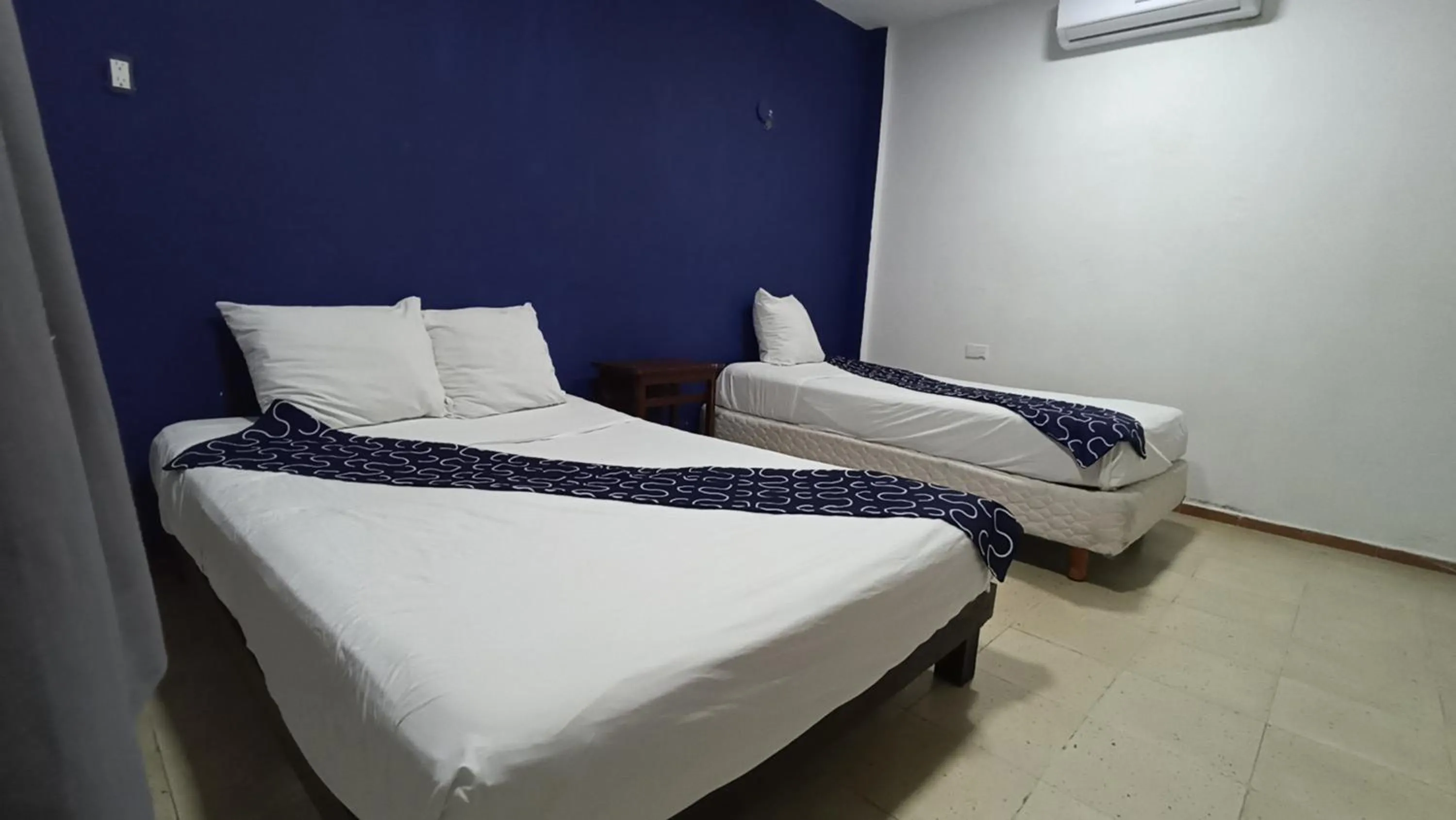 Bed in Hotel Tropical