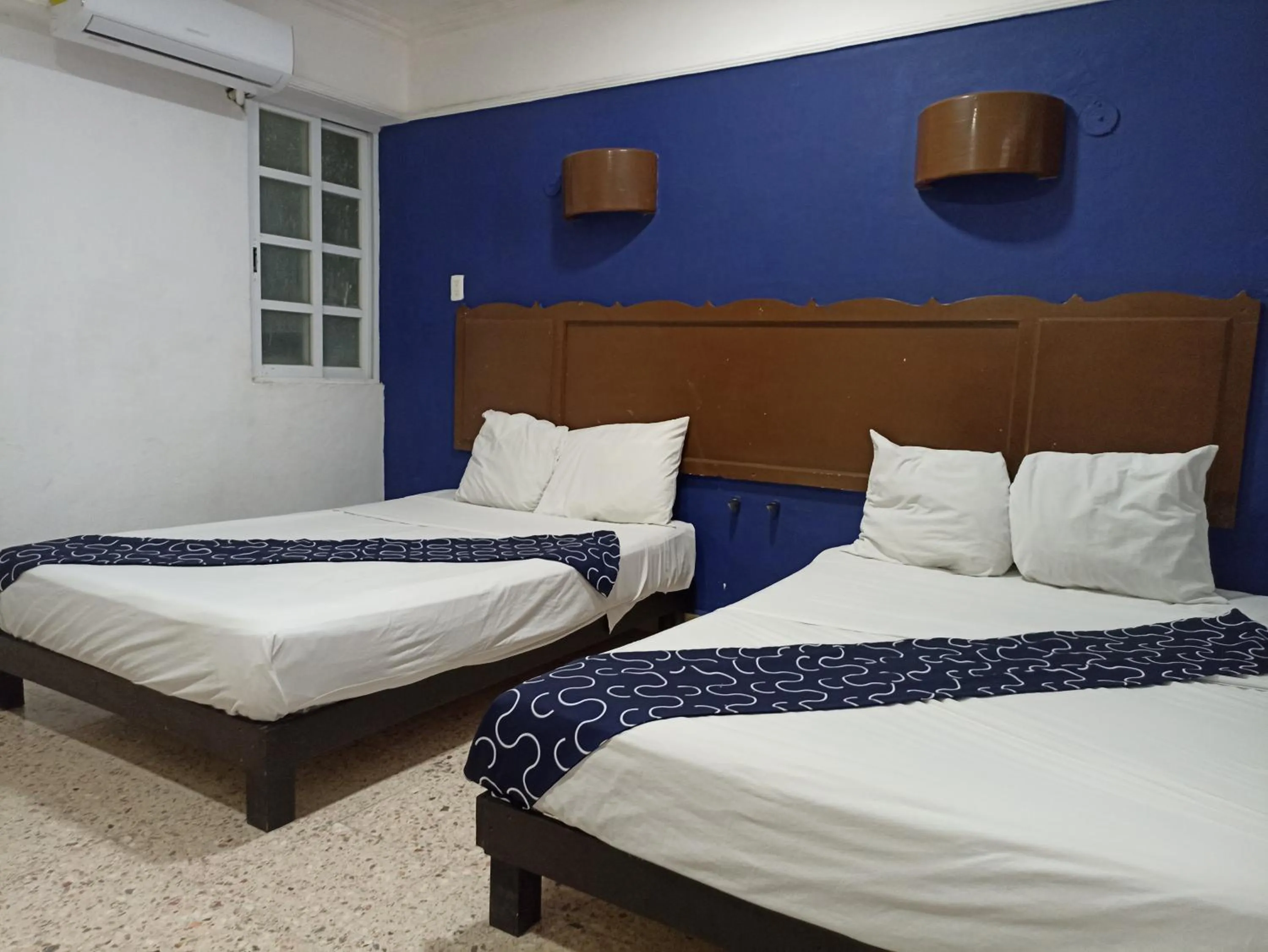 Bed in Hotel Tropical