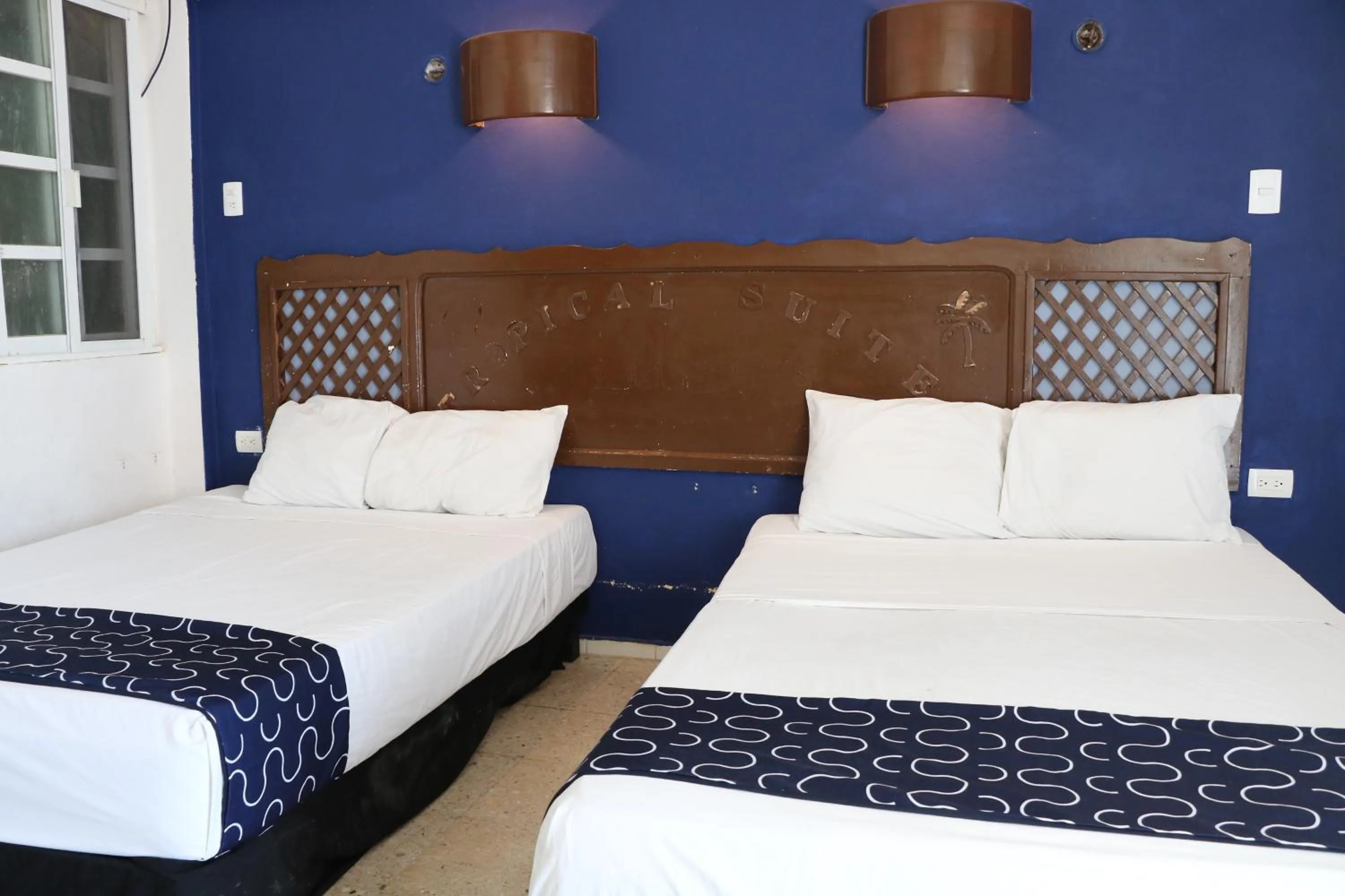 Bed in Hotel Tropical