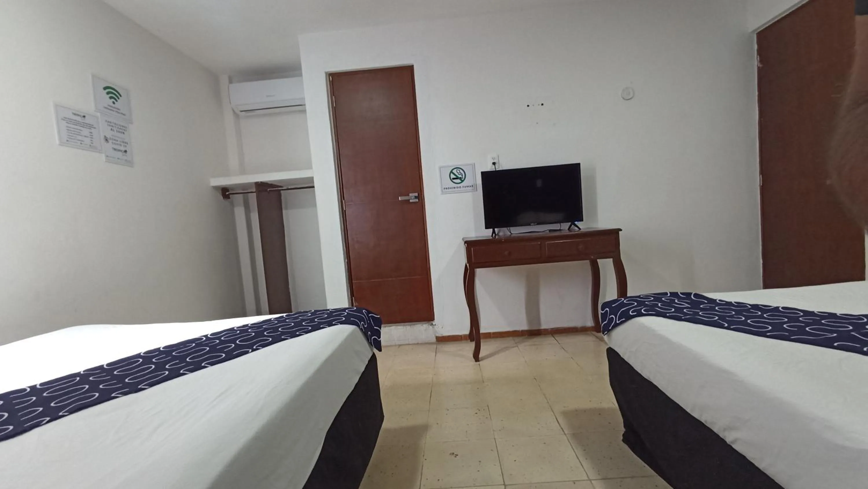 Bed in Hotel Tropical