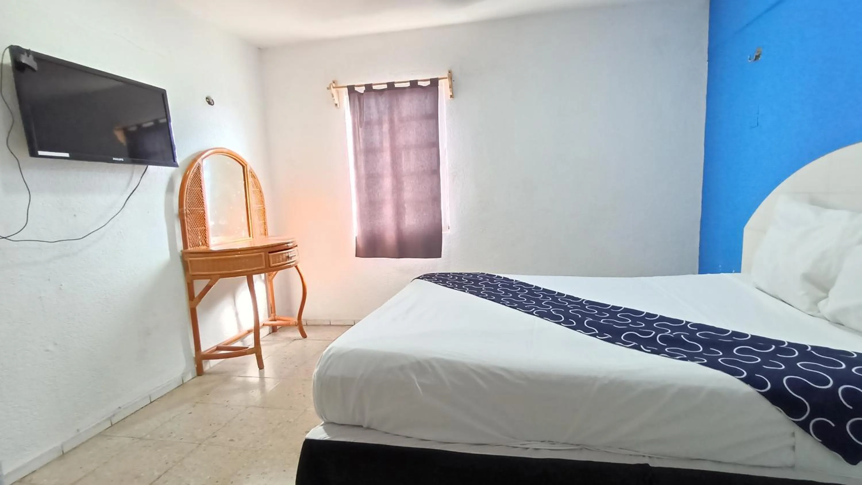 Bed in Hotel Tropical