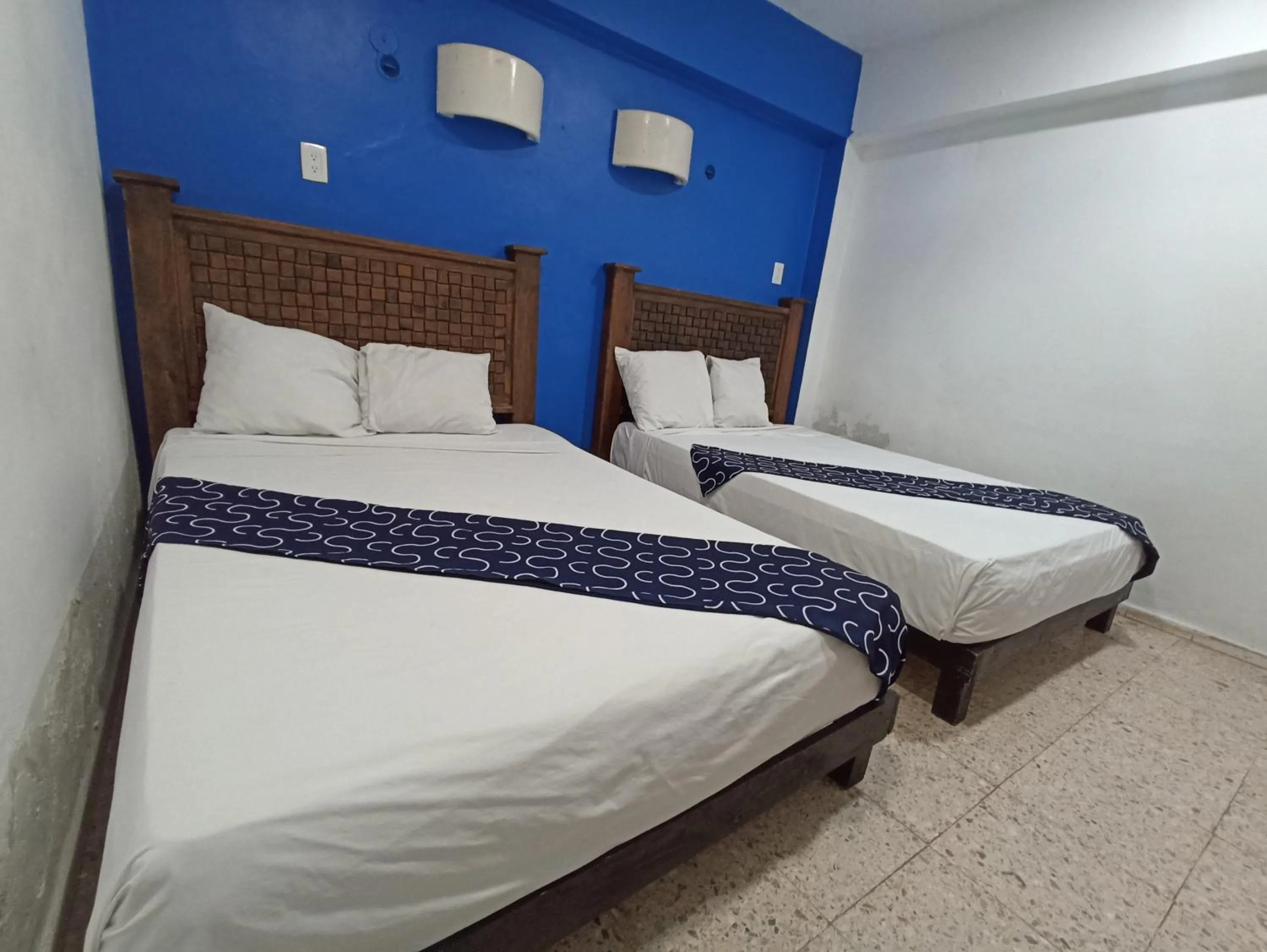 Bed in Hotel Tropical