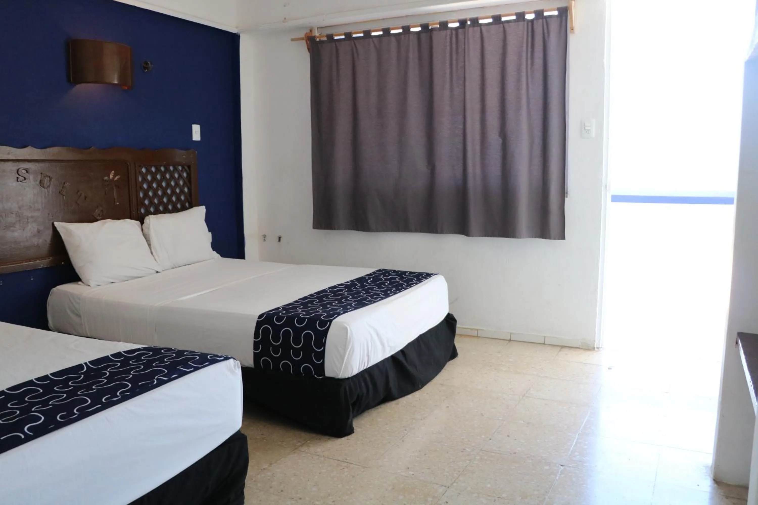 Bed in Hotel Tropical