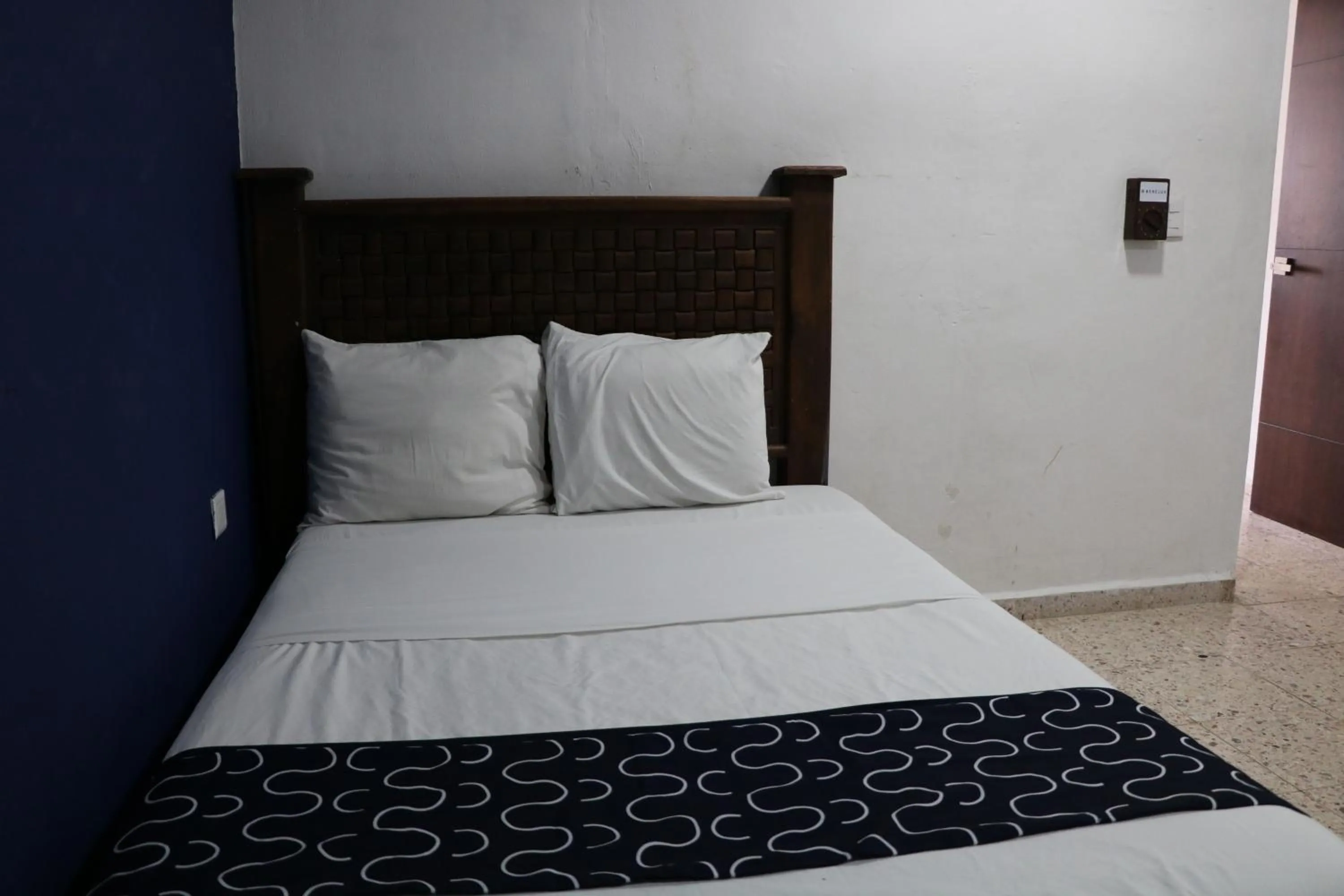 Bed in Hotel Tropical