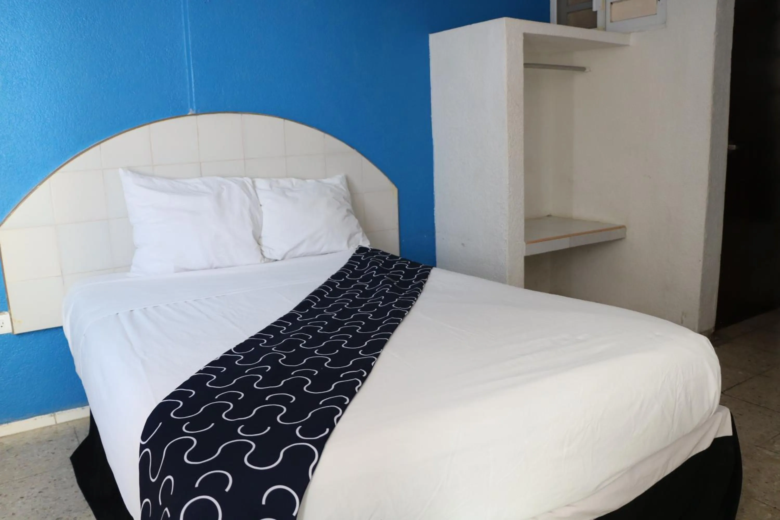 Bed in Hotel Tropical