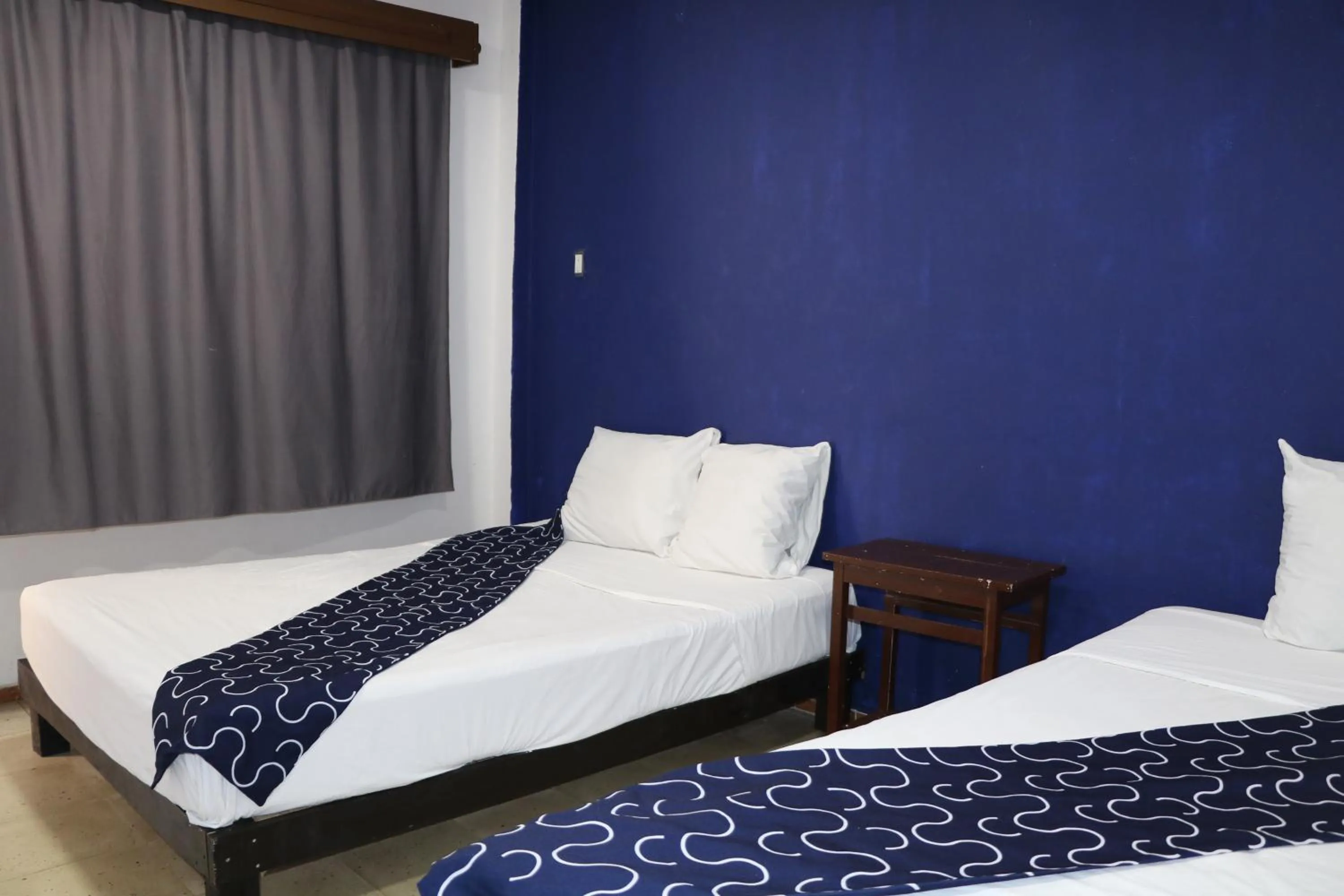 Bed in Hotel Tropical