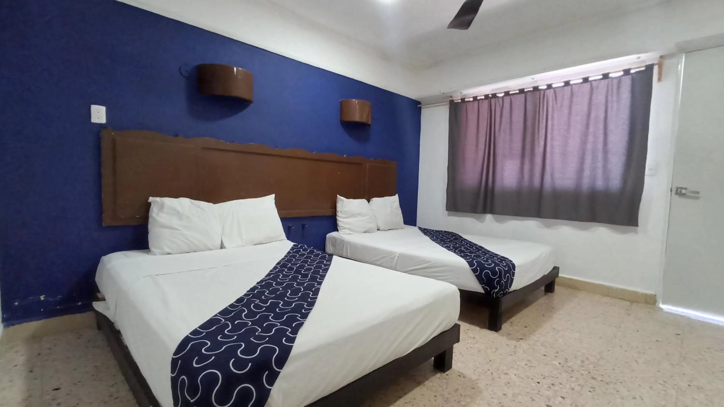 Bed in Hotel Tropical