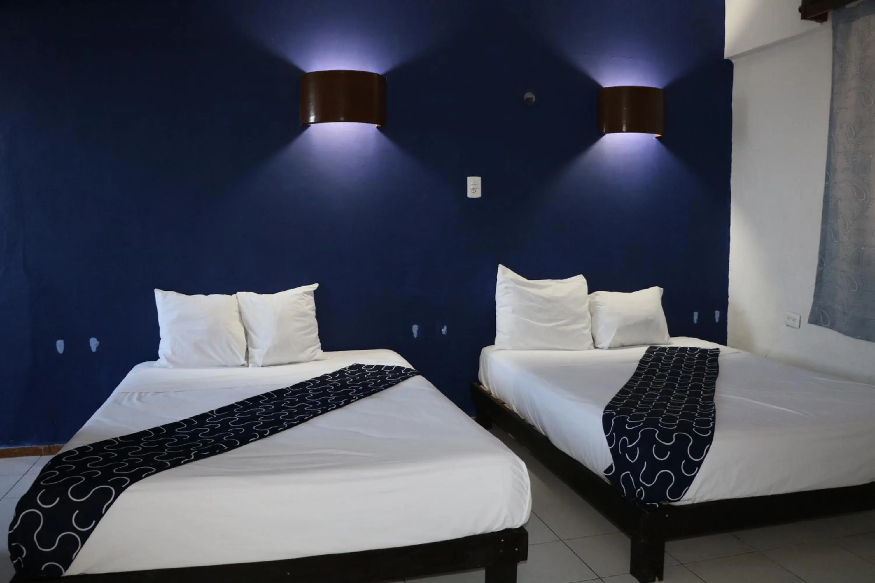 Bed in Hotel Tropical