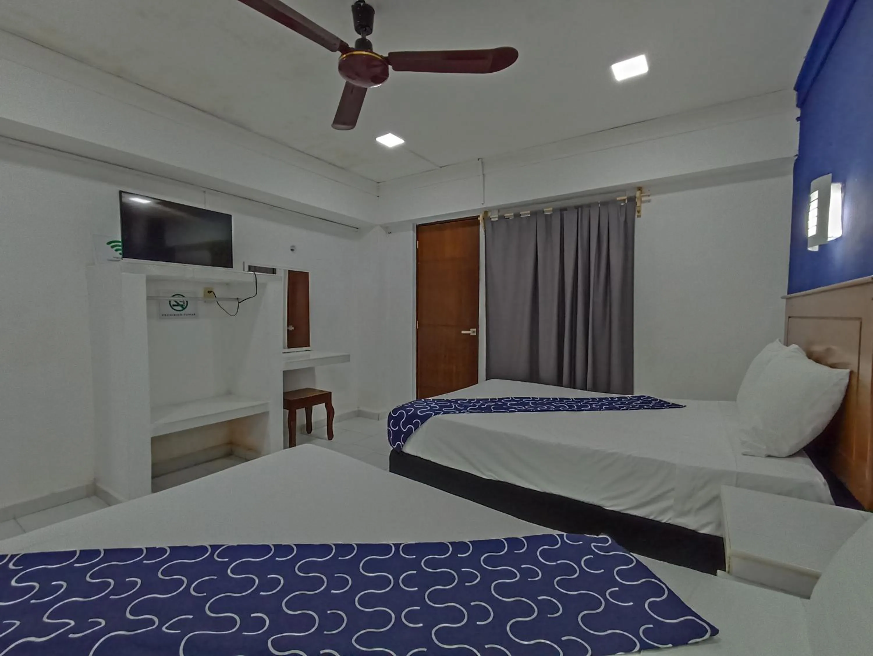 Bed in Hotel Tropical