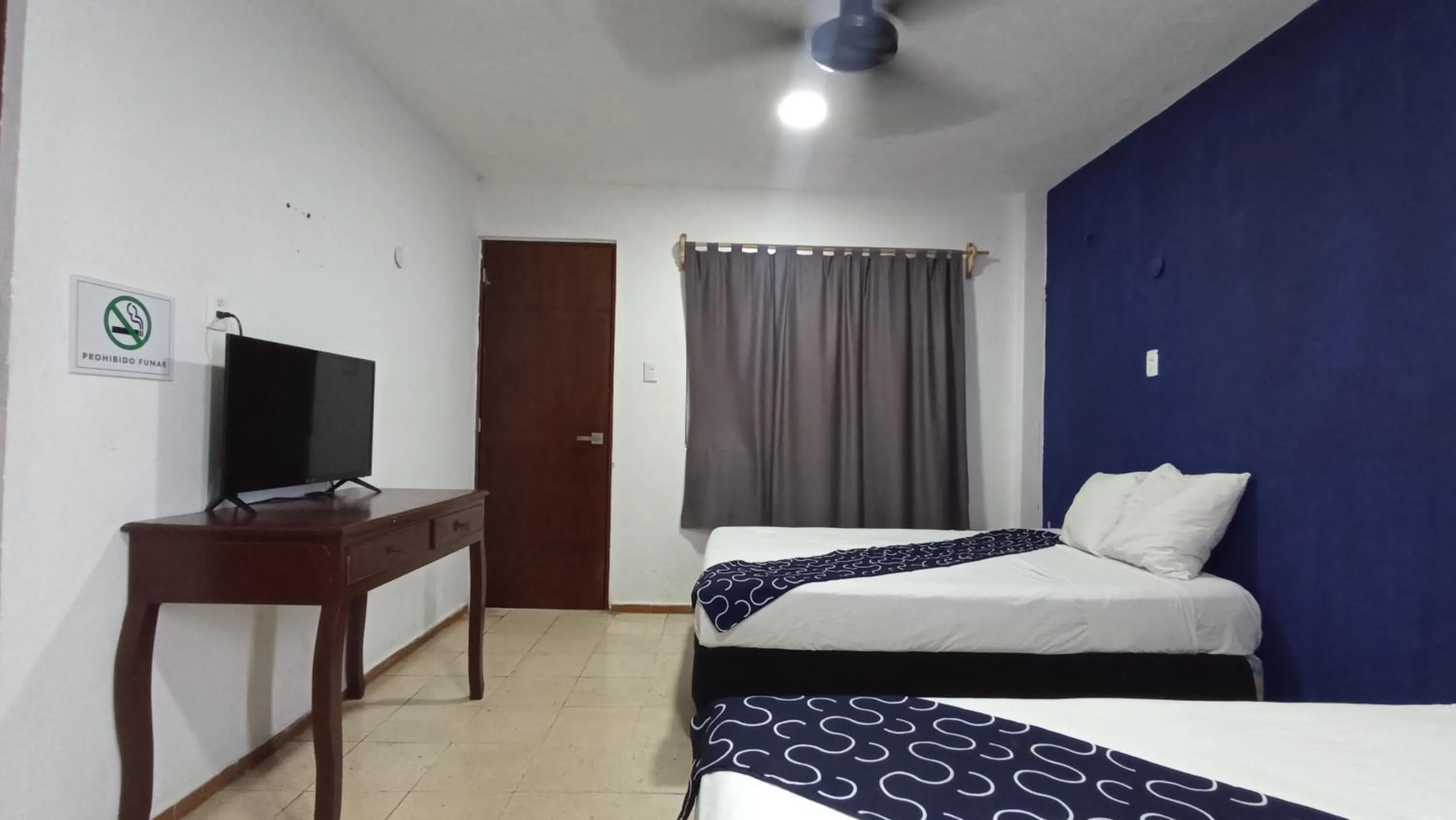 Bed in Hotel Tropical