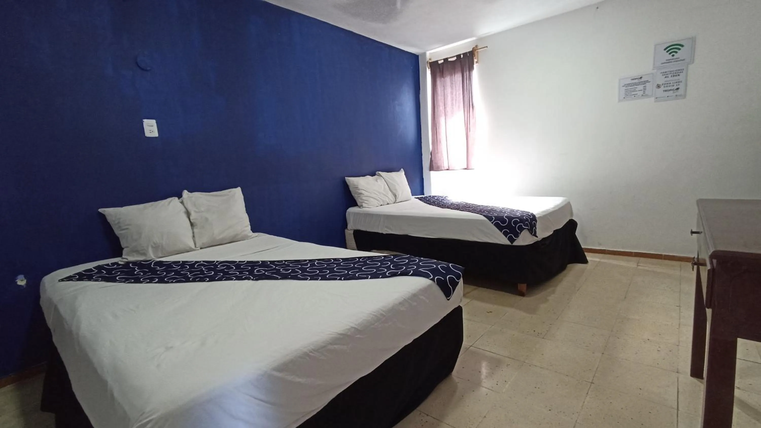 Bed in Hotel Tropical