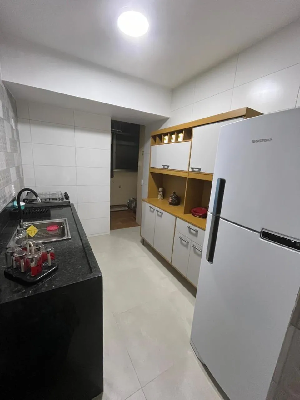 Kitchen or kitchenette in Apartamento Praia do Forte CF