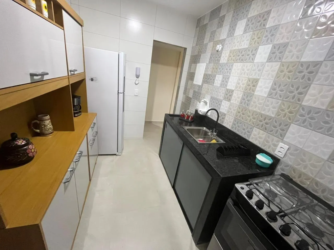 Kitchen or kitchenette in Apartamento Praia do Forte CF