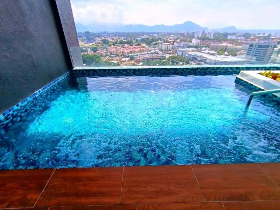 Swimming pool in The Horizon Ipoh Dual L13 by Grab A Stay