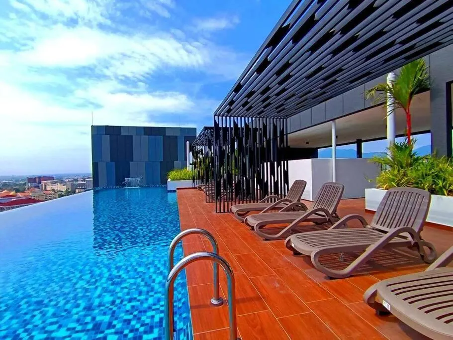 Swimming pool in The Horizon Ipoh Dual L13 by Grab A Stay