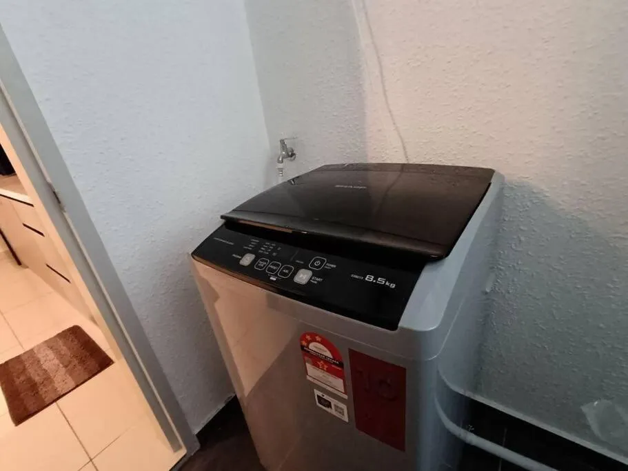 washing machine in The Horizon Ipoh Dual L13 by Grab A Stay