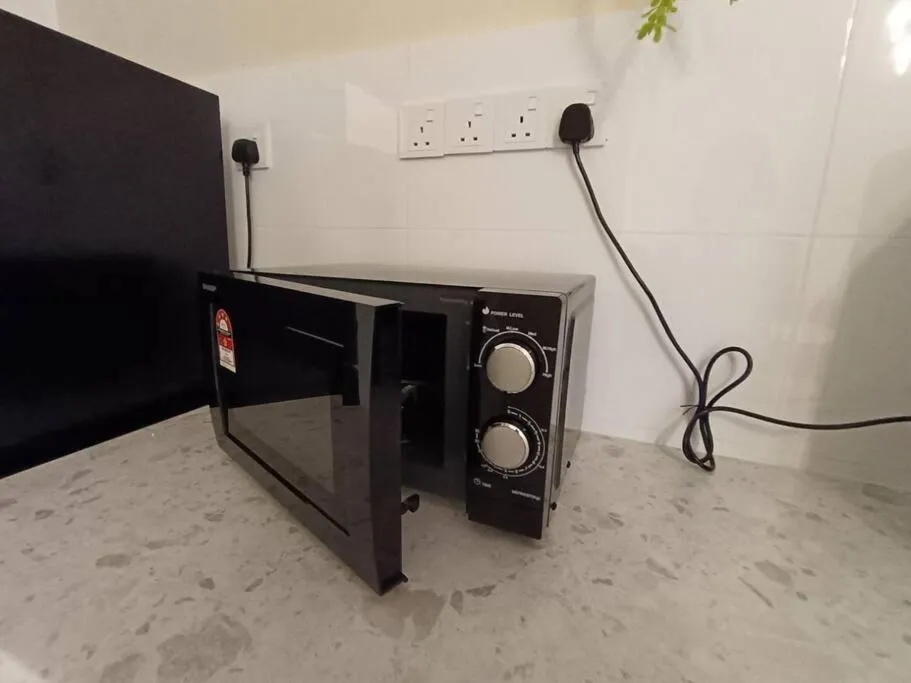 Kitchen or kitchenette in The Horizon Ipoh Dual L13 by Grab A Stay