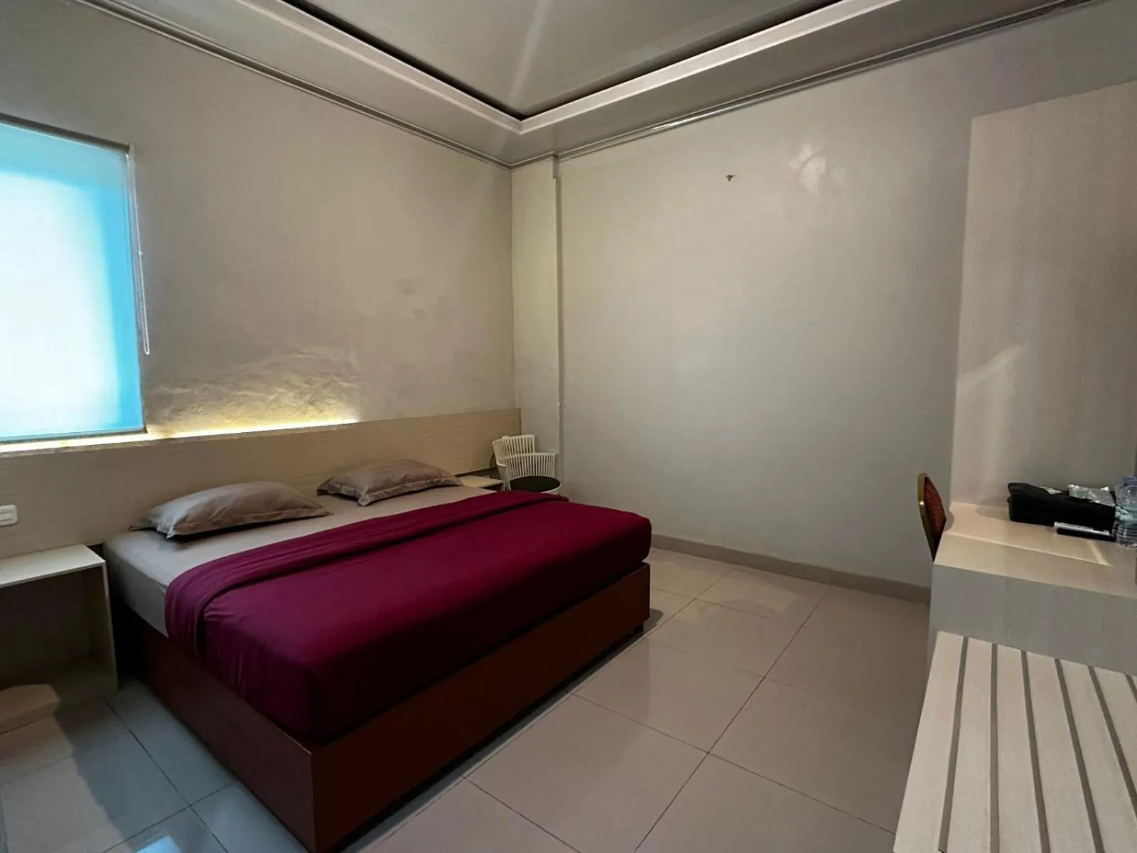 Bed in Grands Orchid Hotel