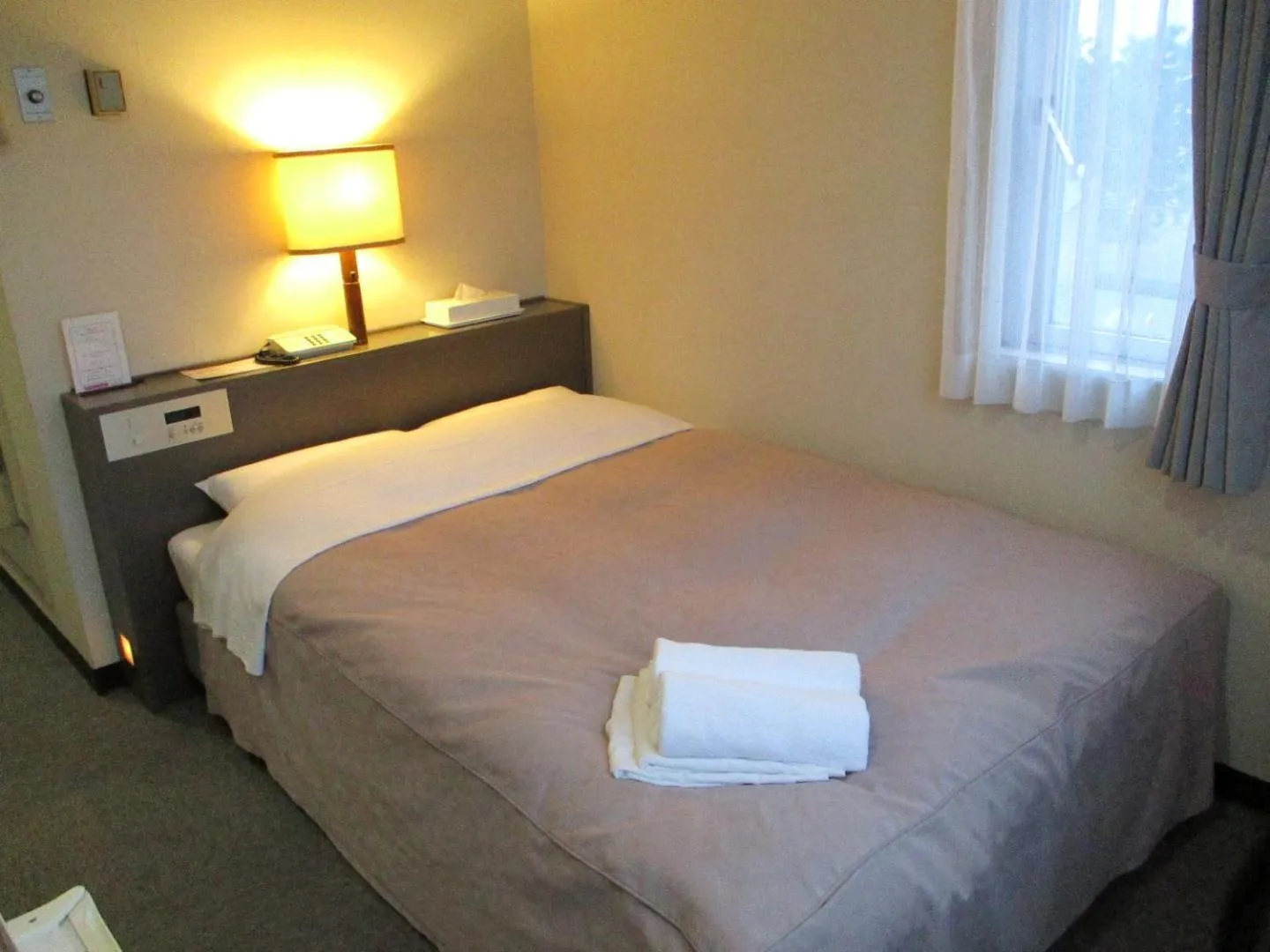 Bed in Hotel Heart Inn